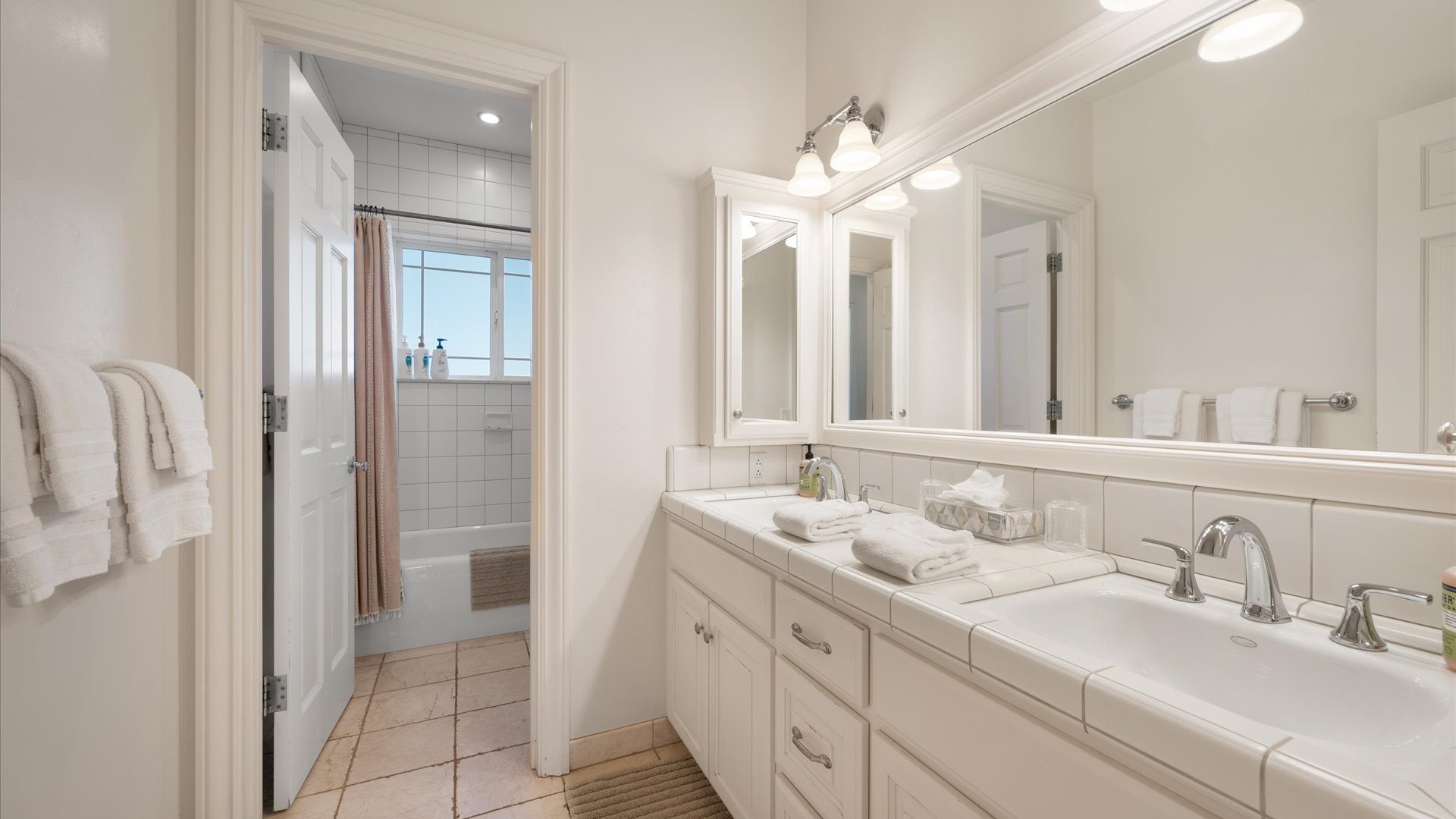 Hall bath, a full bathroom feautring a shower tub combo