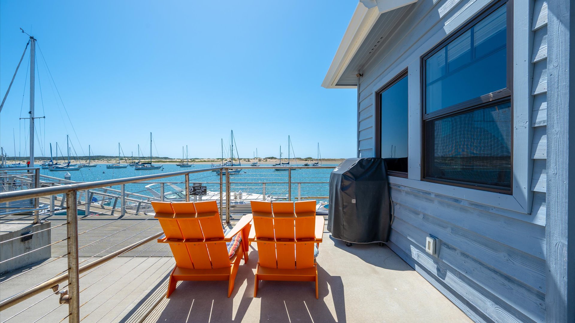 Kick back in these Adirondack chairs while grilling up your steaks on the BBQ grill