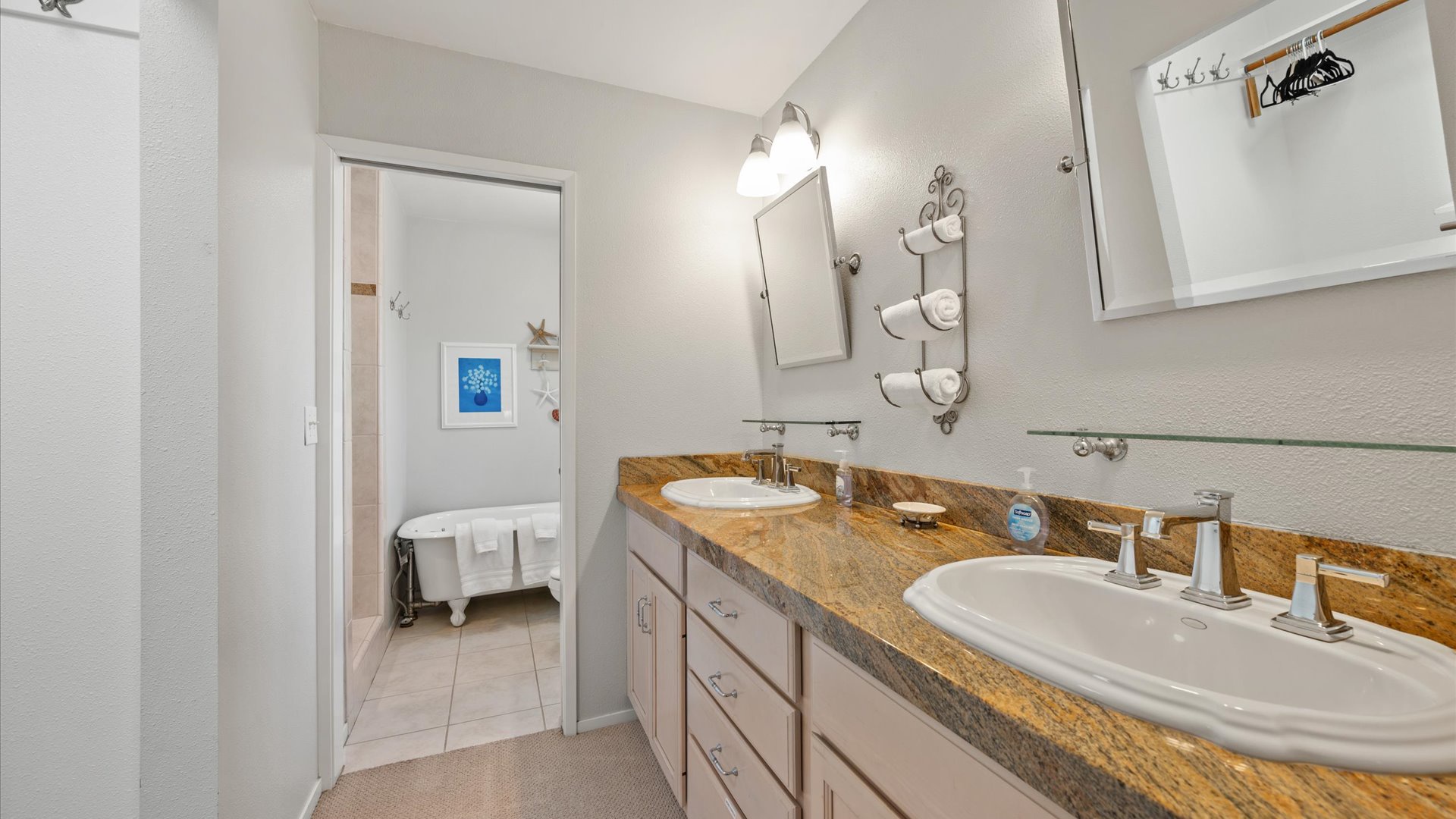 The master bath offers dual vanity sinks and step in shower with a seperate soaking tub