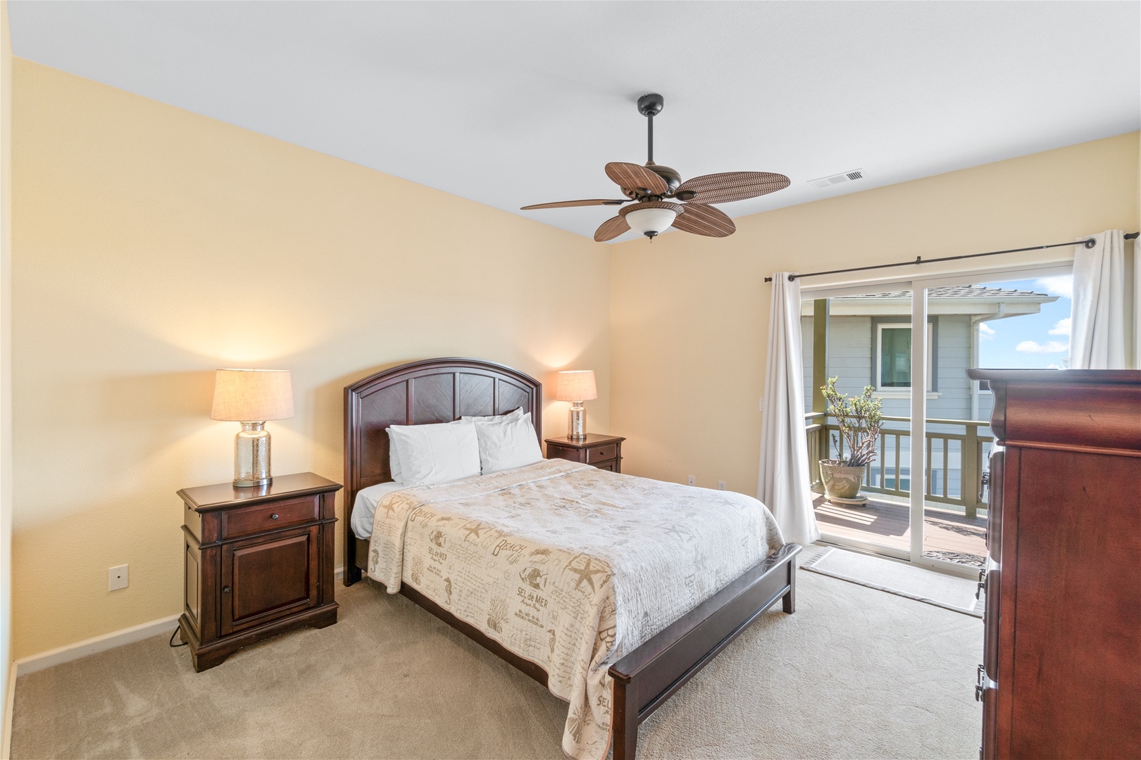 The third bedroom has a King bed with access to the lower level deck