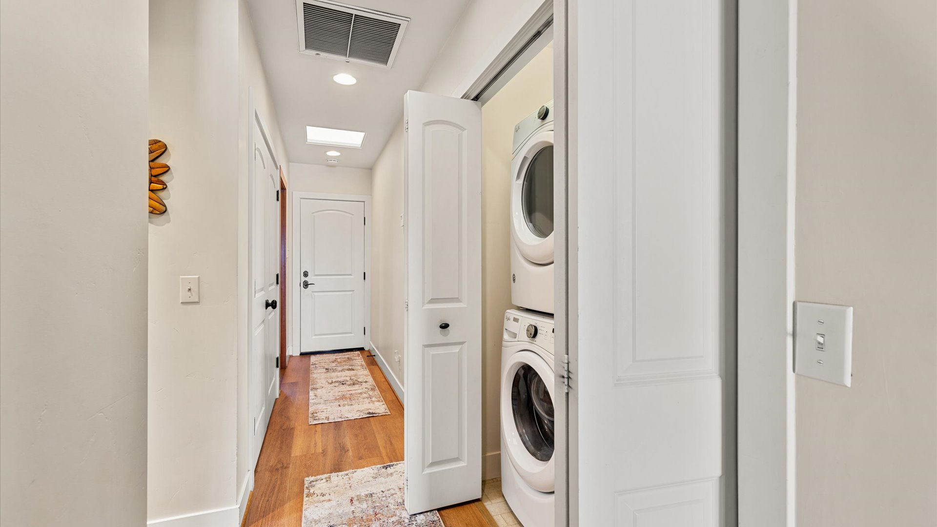 Washer and Dryer located in the hallway for guest use