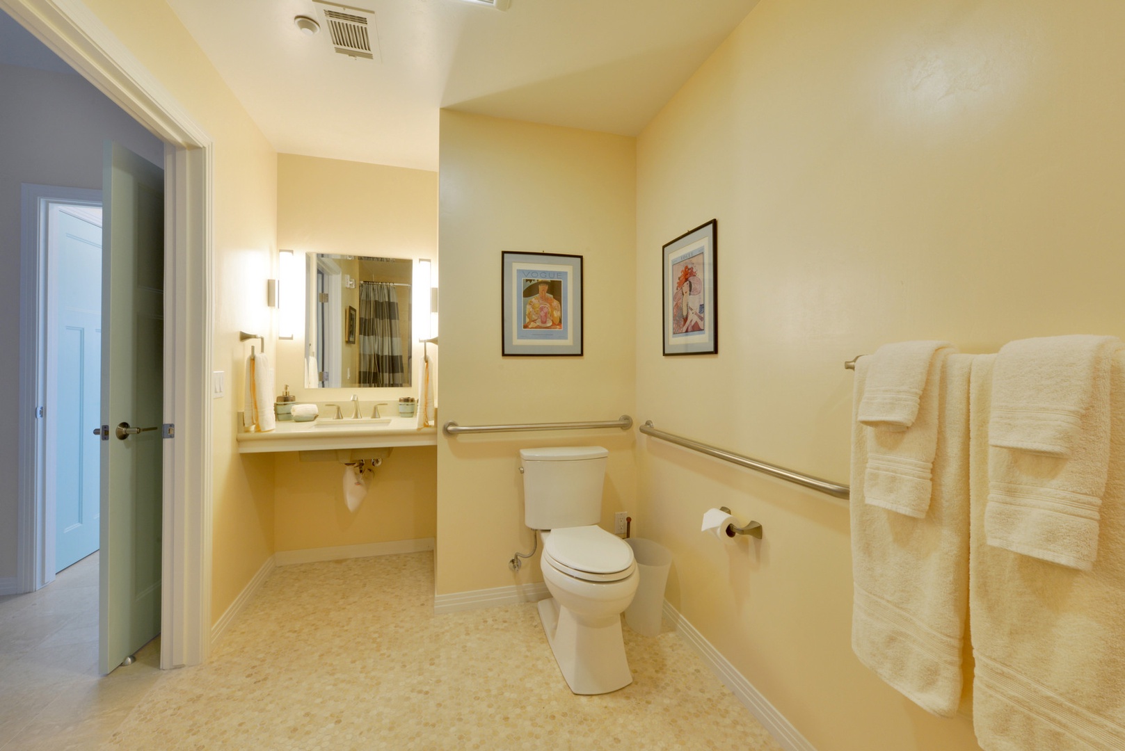 The spacious full bath is located off the bedroom.