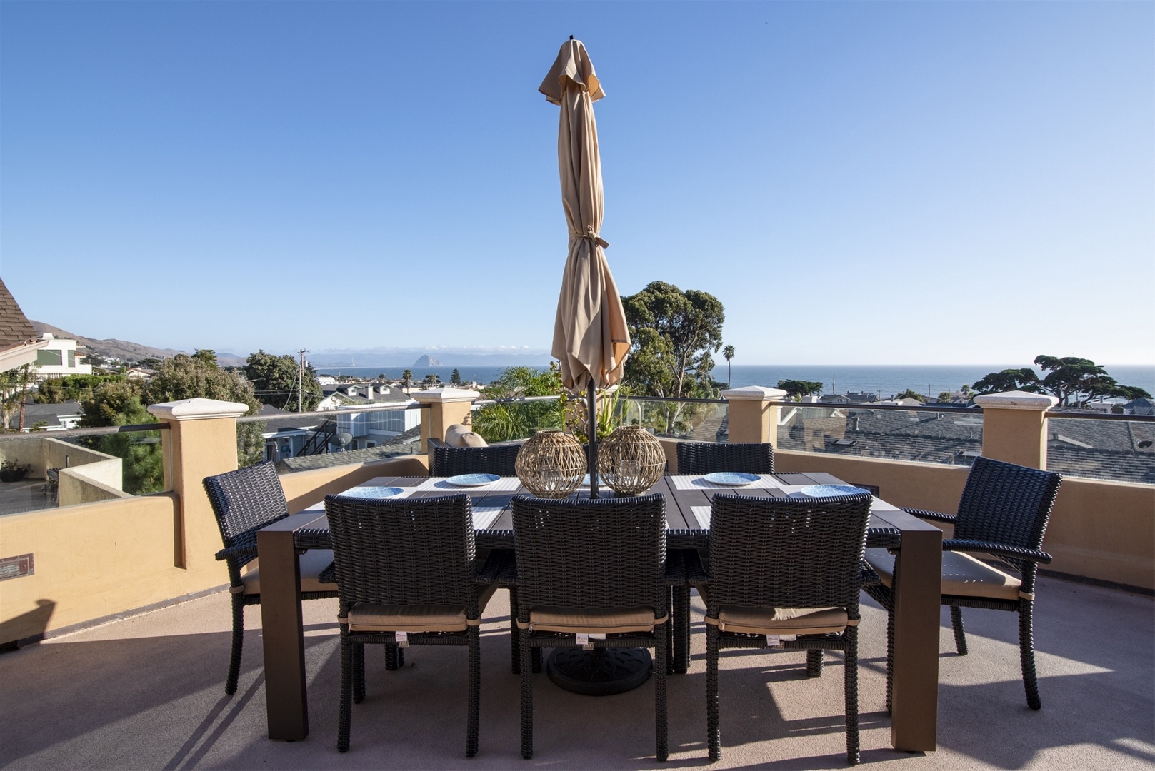 This outdoor dining on the deck is located right off the kitchen