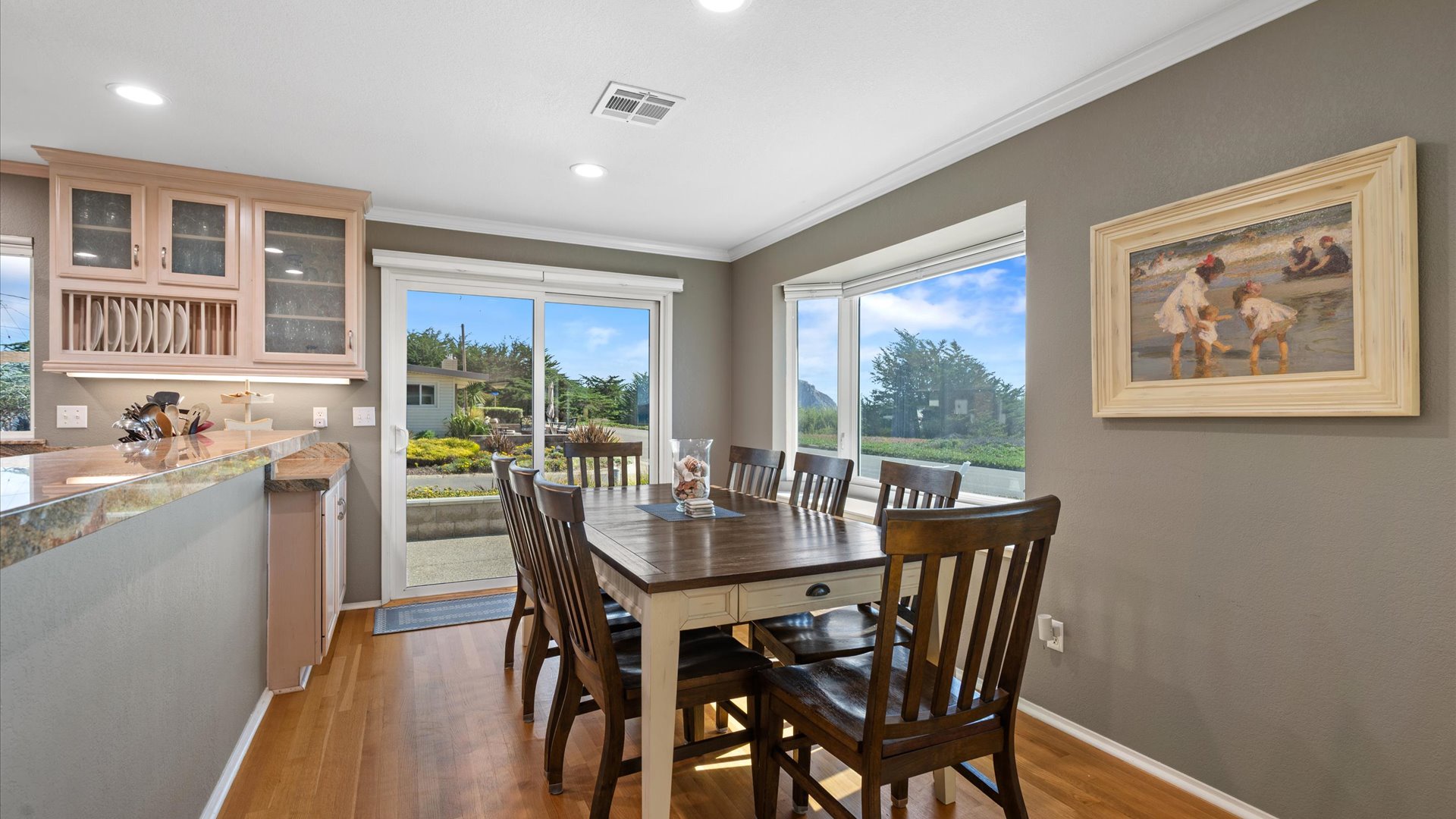 The dining area has seating for 8, a perfect spot to gather to eat or play games with the whole family