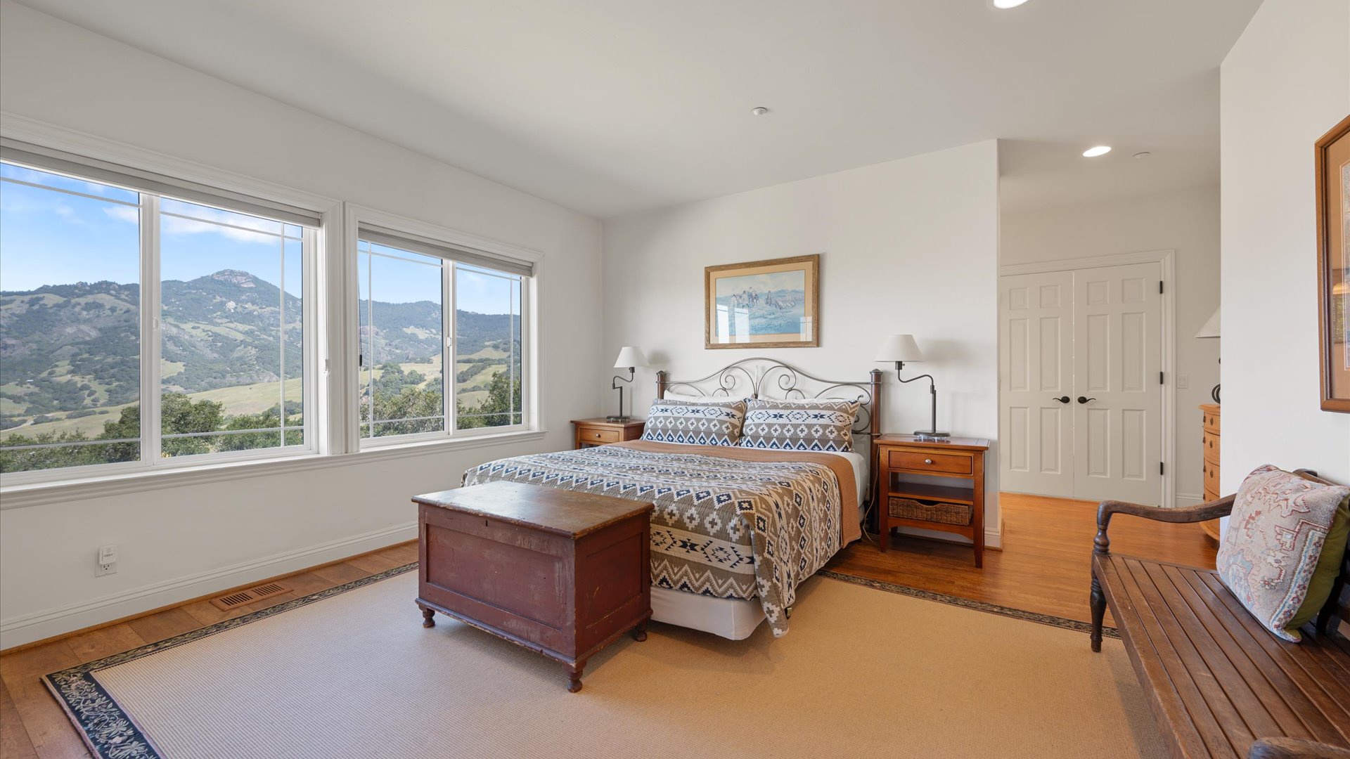 Wake up to stunning mountain views in the North primary bedroom