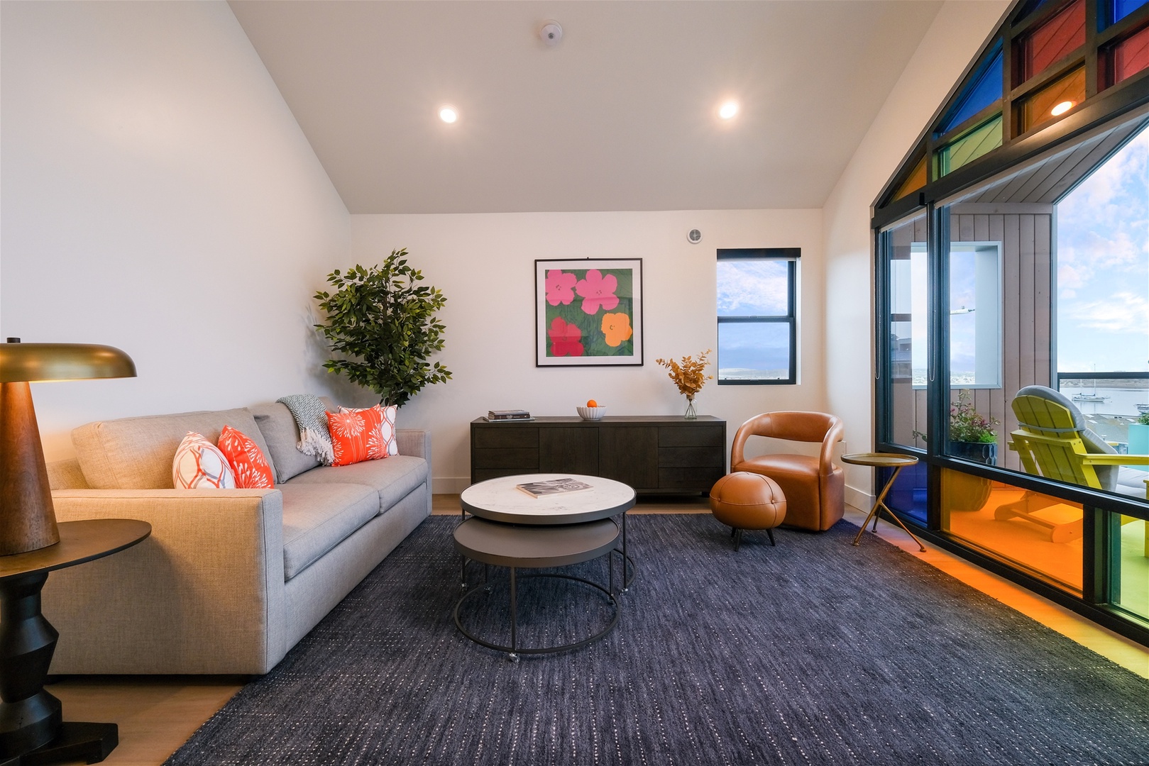Living room features a queen sized sleeper sofa for additional sleeping space