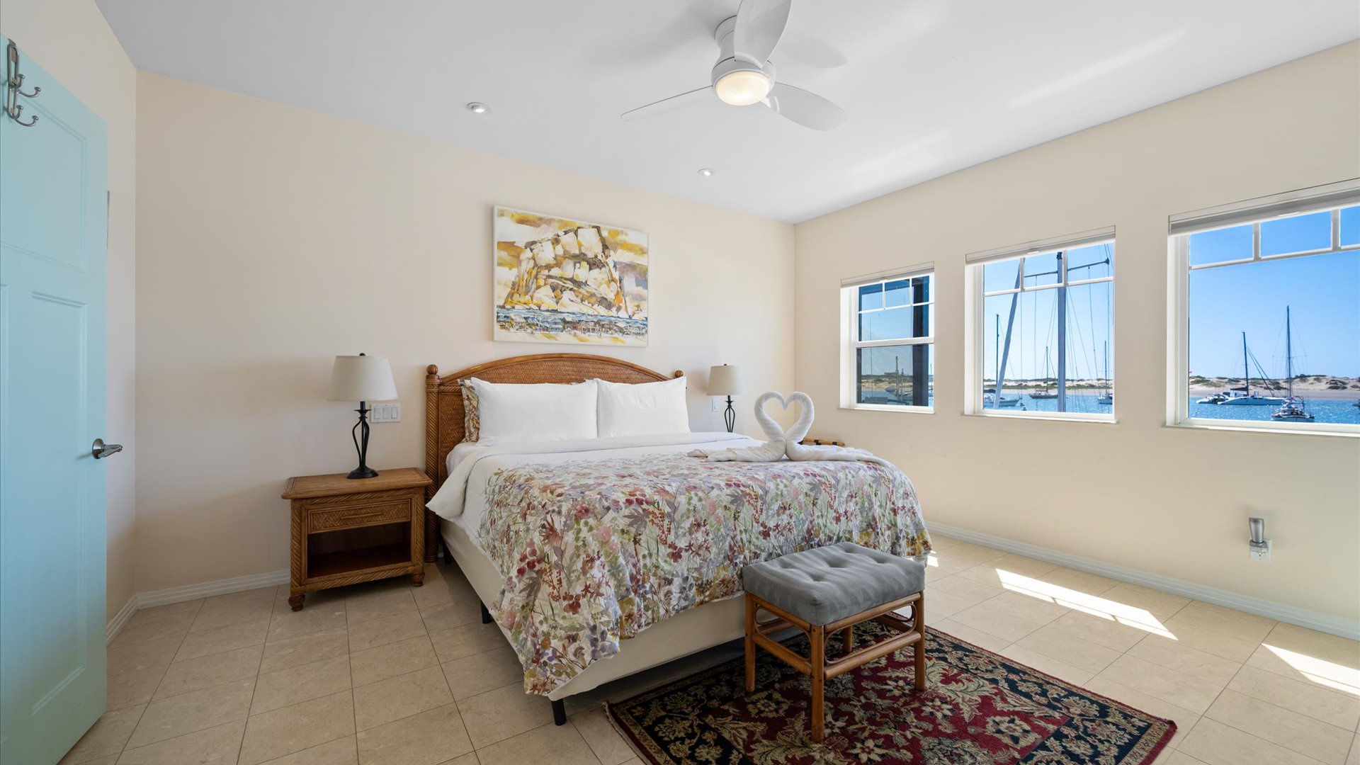 Master bedroom with king bed also has fabulous views of the harbor.