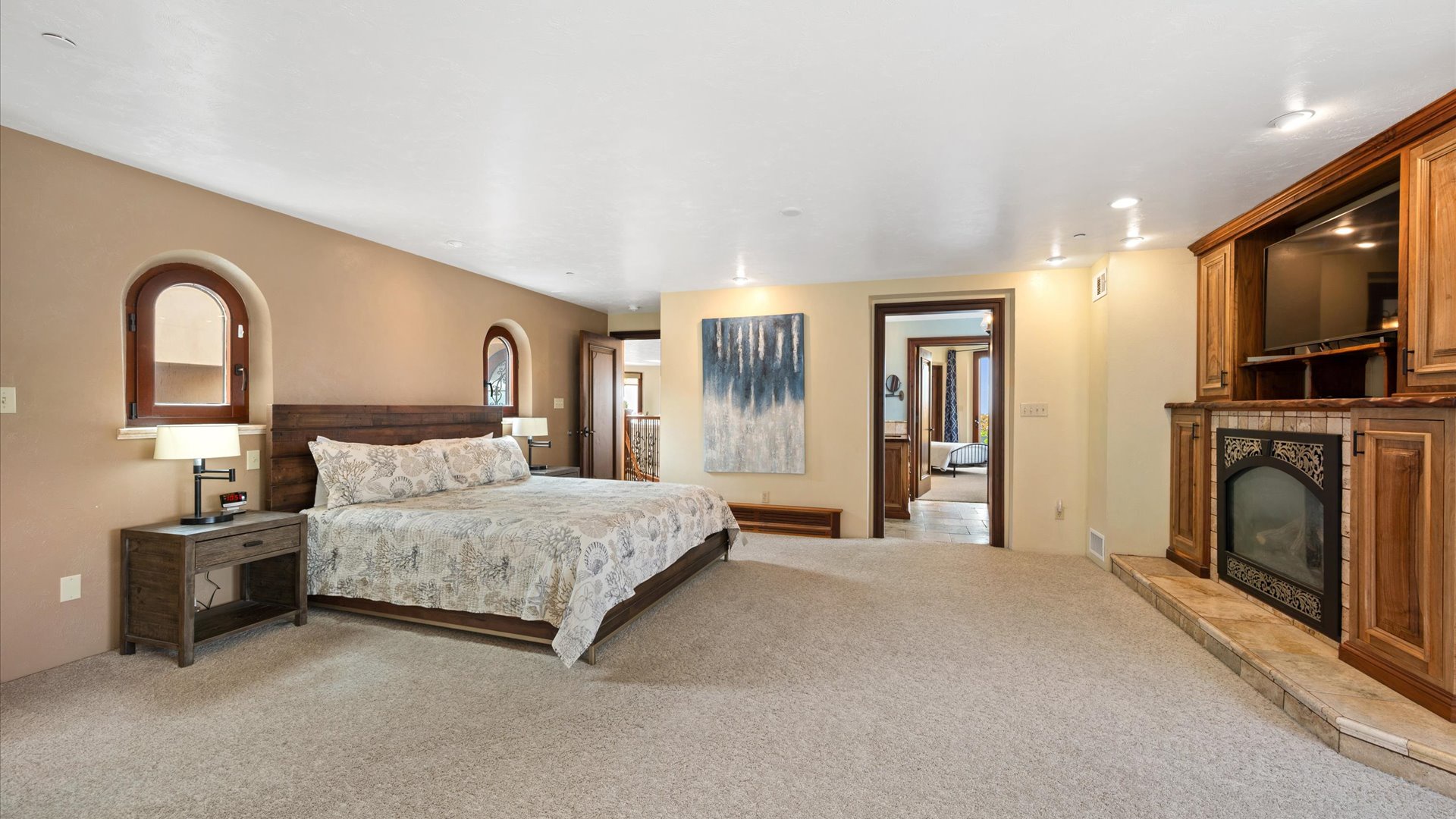 Big Sur Suite  located upstairs features a Cal King size bed, fireplace, flat screen TV, en suite bathroom