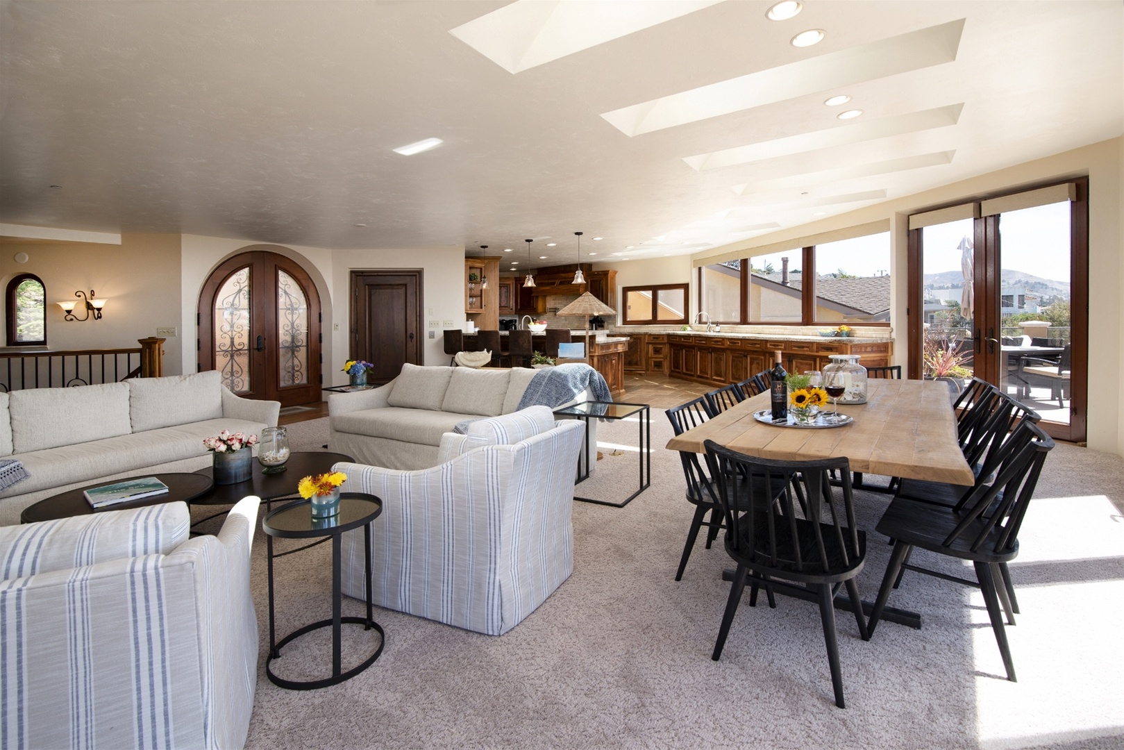 The dining area opens to living room and kitchen, perfect for entertaining