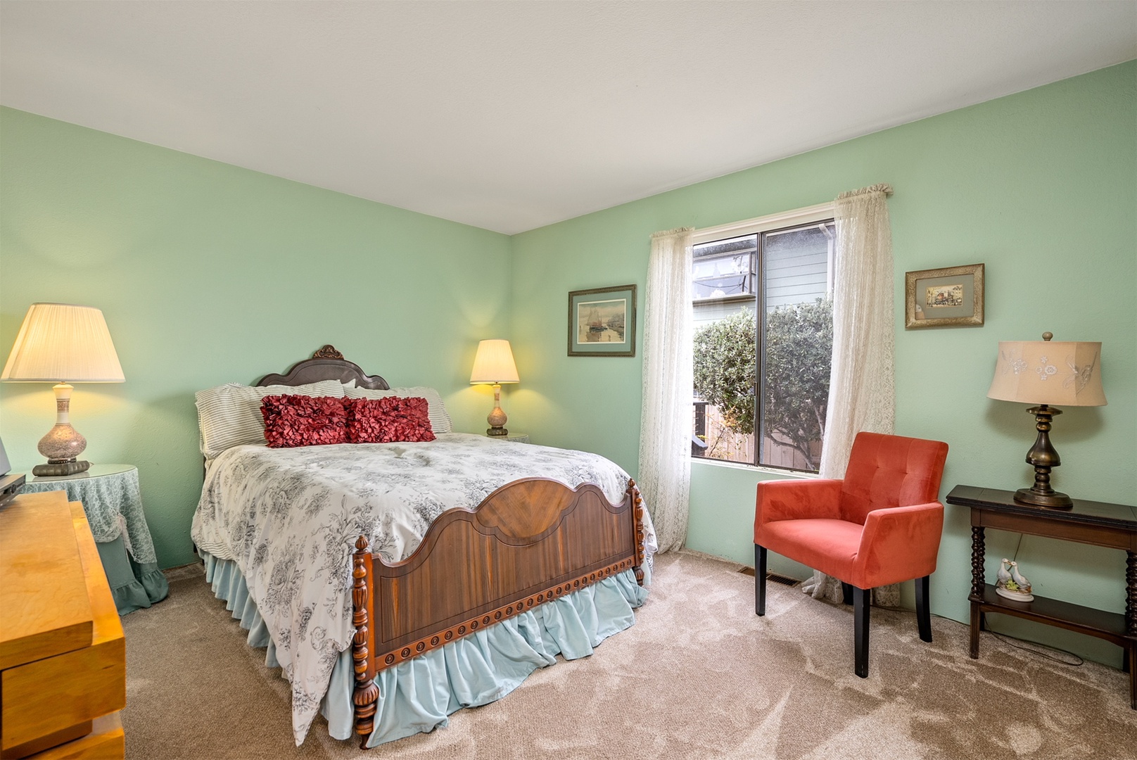 The second bedroom features a queen sized bed.