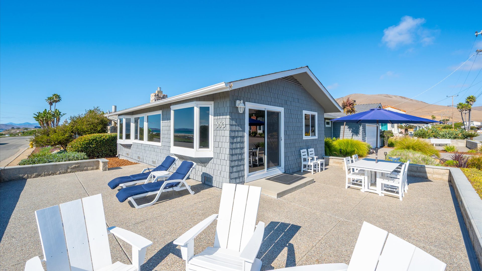 Welcoming front patio area with outdoor furniture
