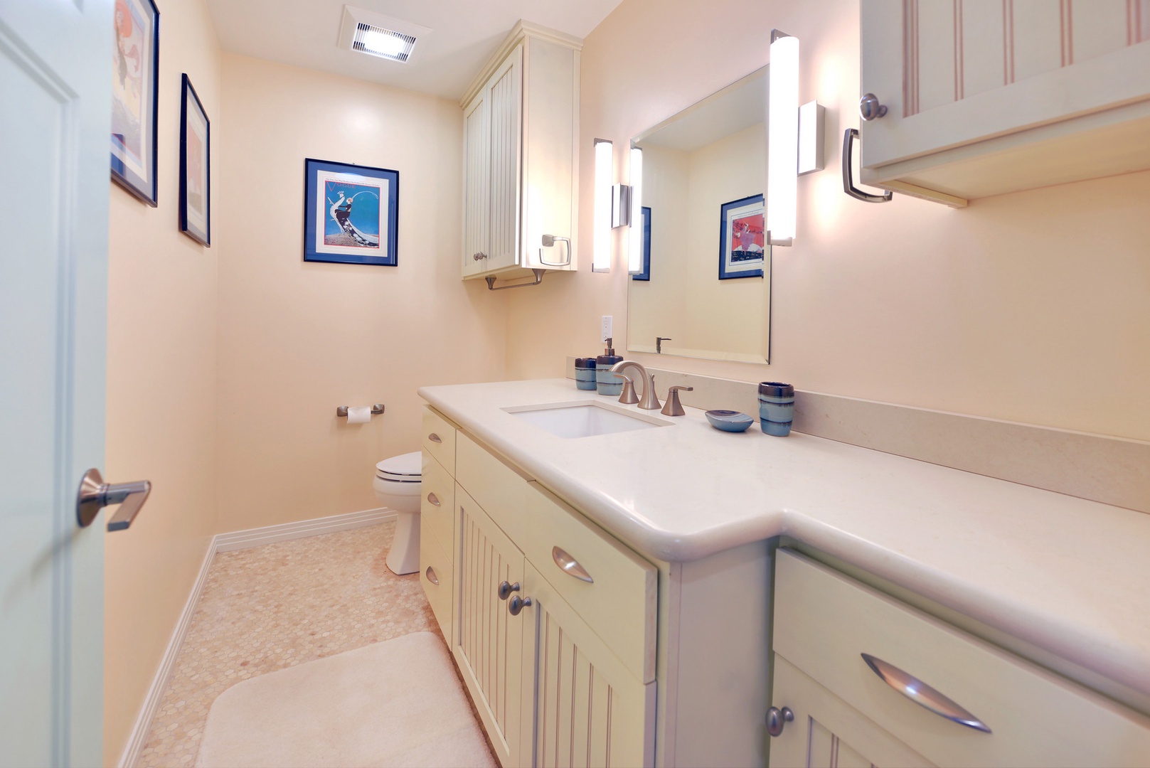 The half bath is easily accessible from the living room.