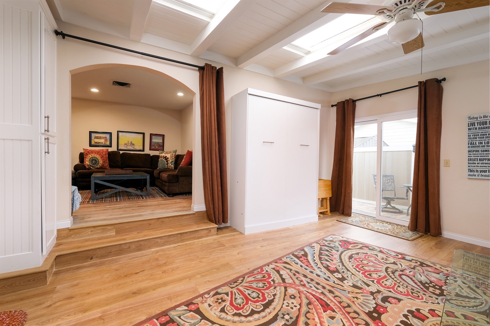 Game room opens to the den and backyard