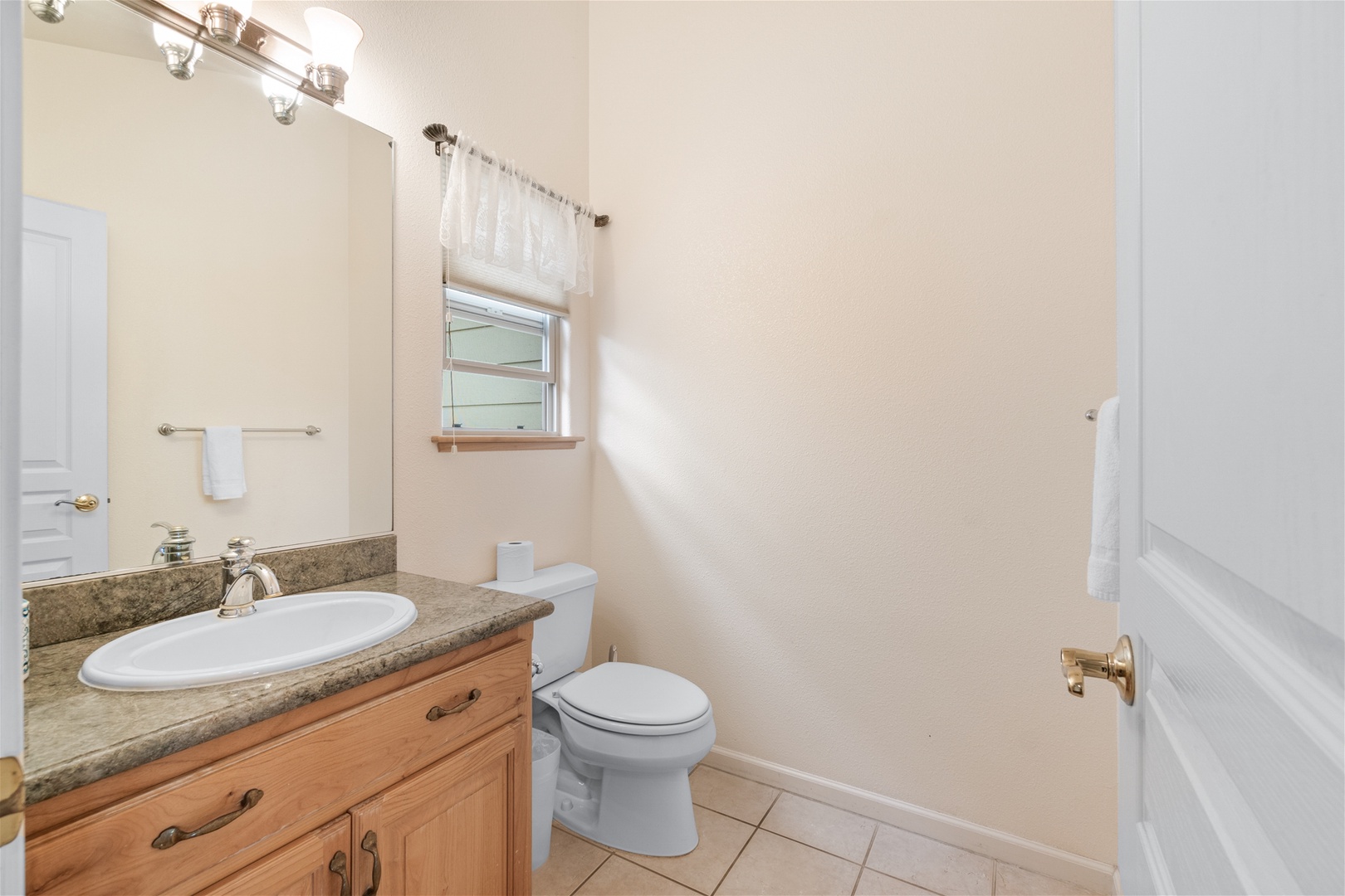 Half bath is upstairs off the common living area.