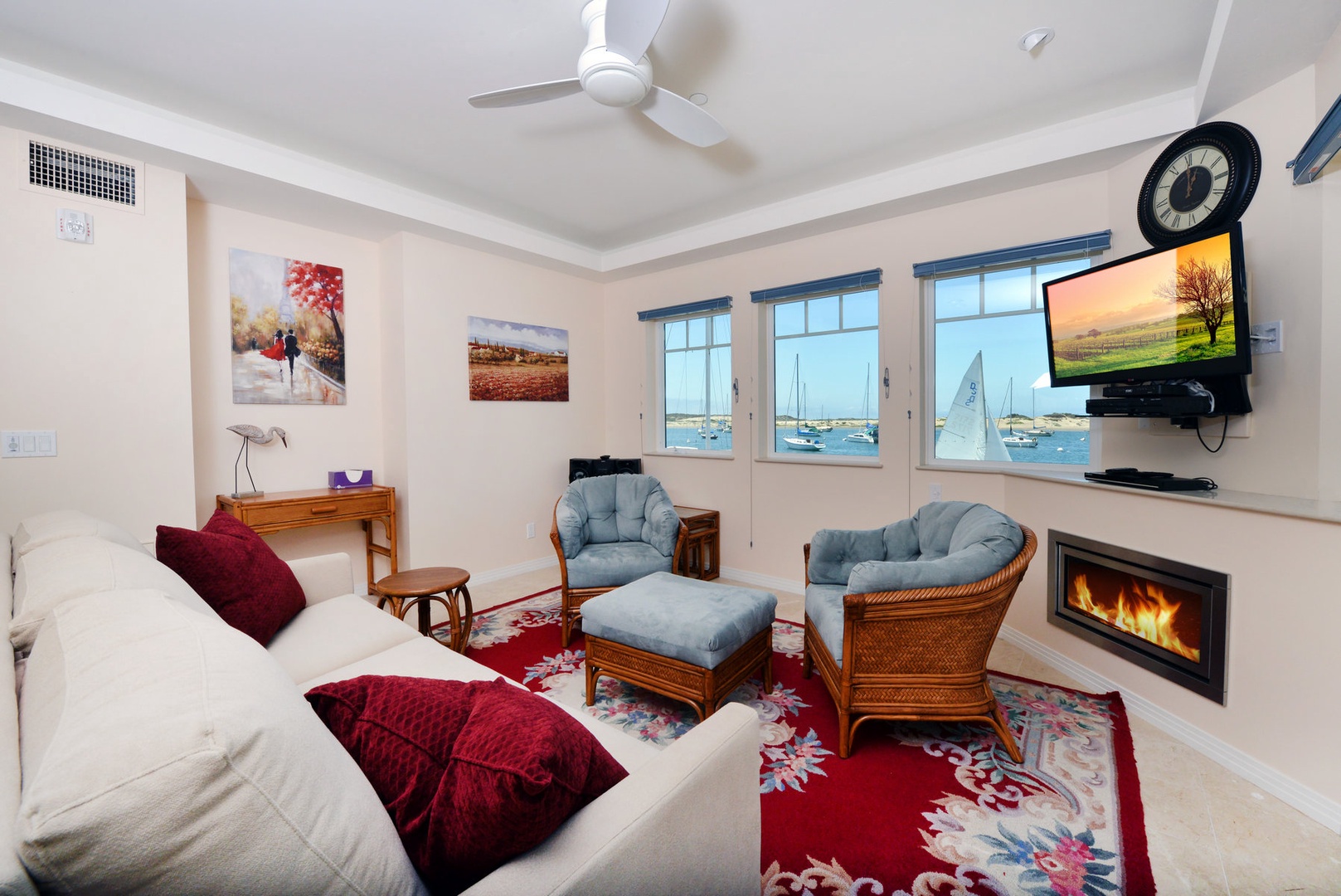 The spacious living room has comfortable seating and views everywhere you look.