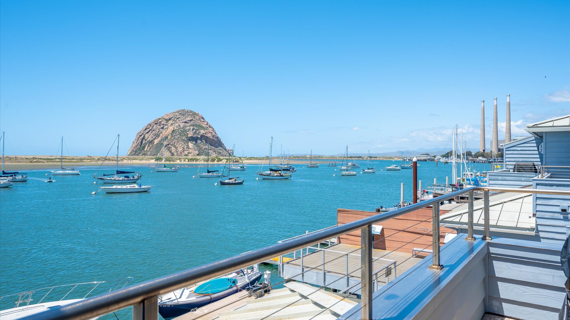 Balcony features a BBQ grill, plus unobstructed views of the harbor and morro rock