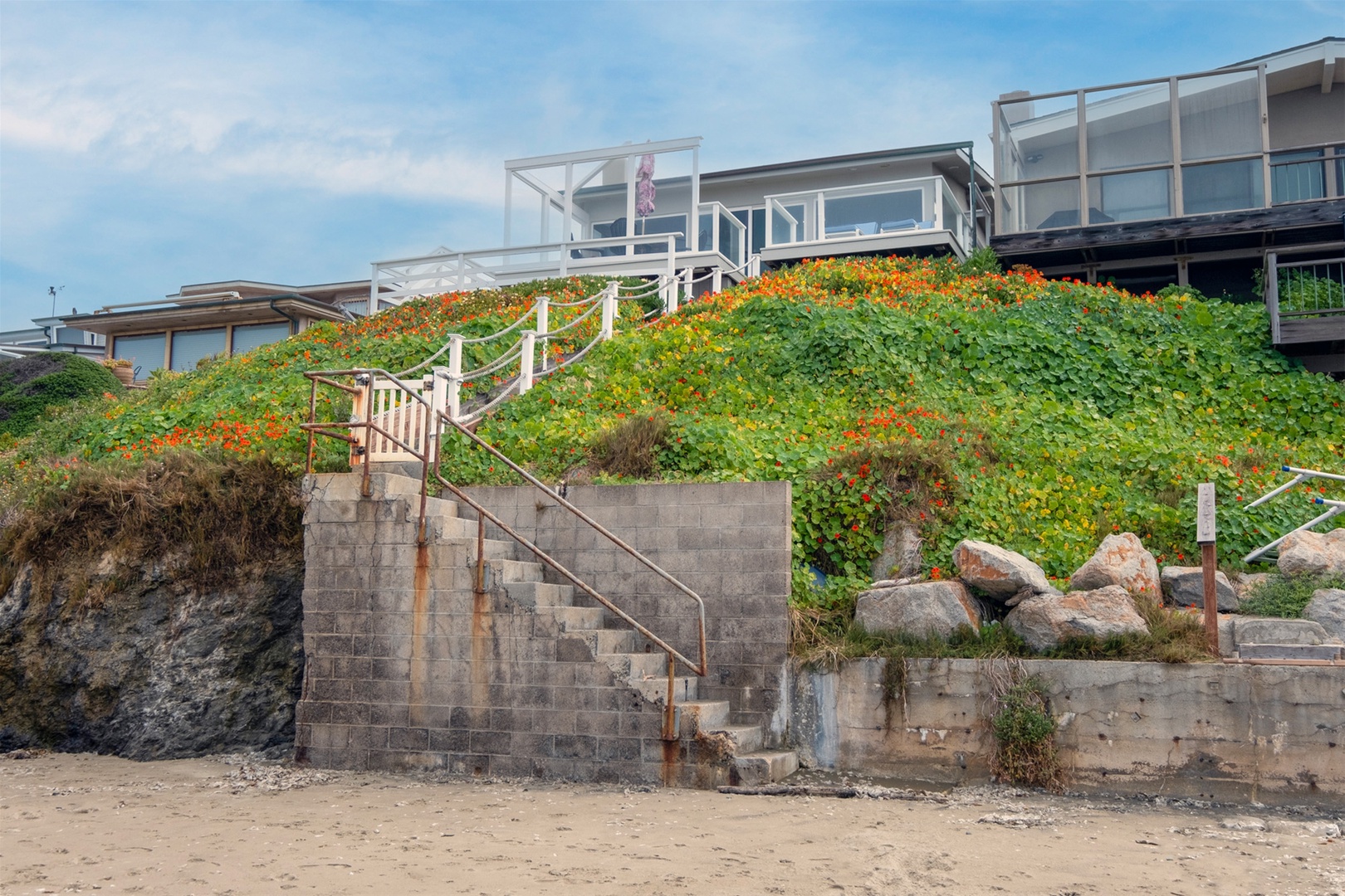 The seal house perched above the sand