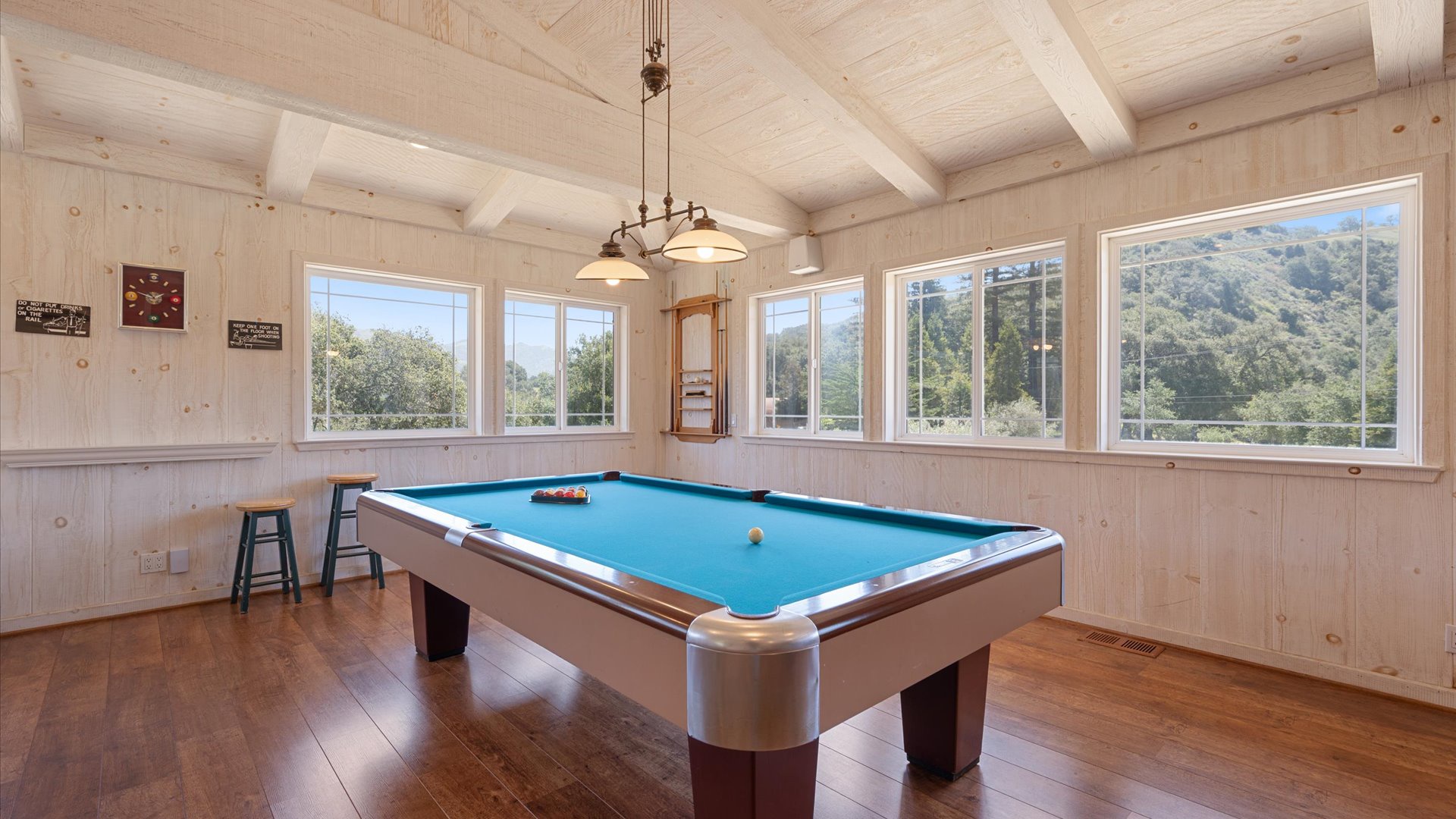 Challenge friends to a game in your bright, airy game room with stunning mountain views framing every shot.