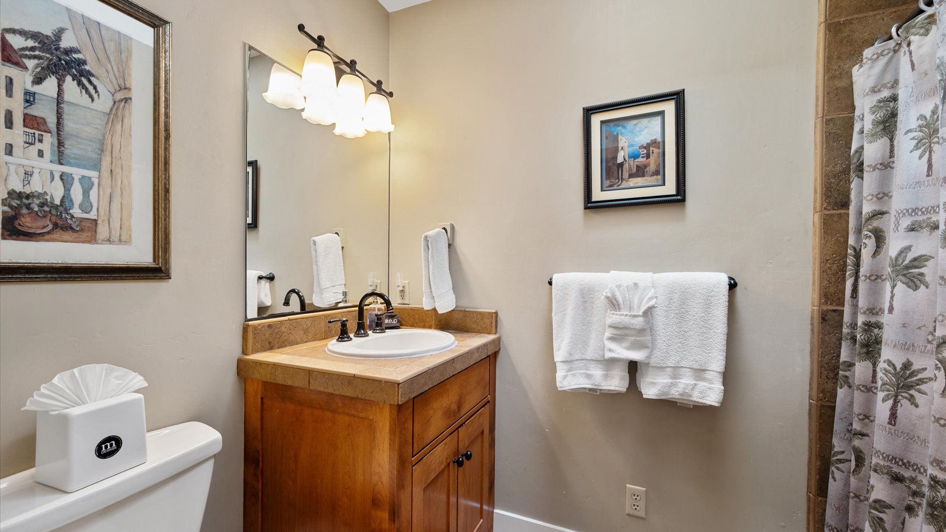 3rd bathroom, off the main hallway, serves the main living areas and the 4th sleeping area.