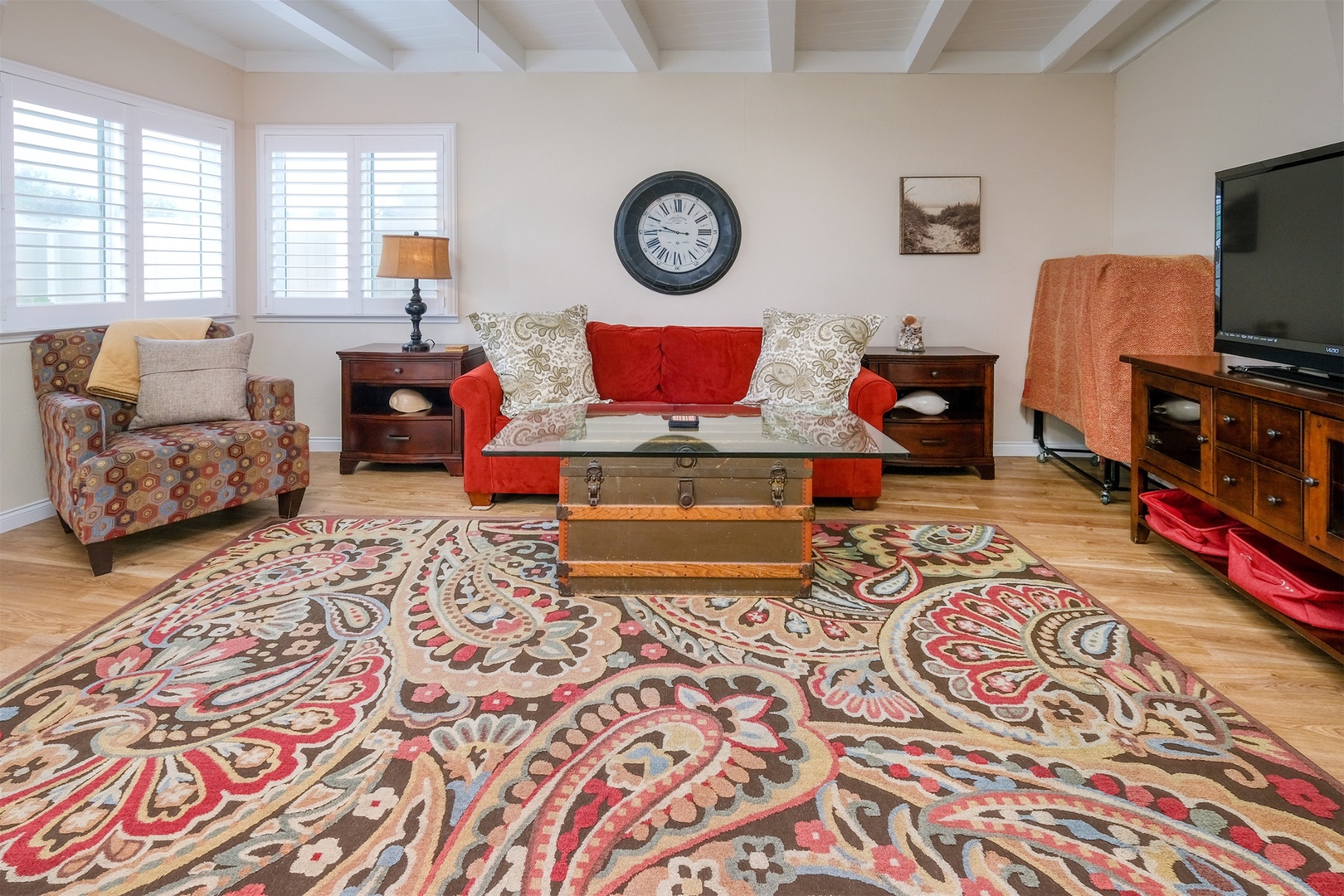 The game room also serves as another sleeping area with a murphy bed. There are curtains to provide privacy from the den area.