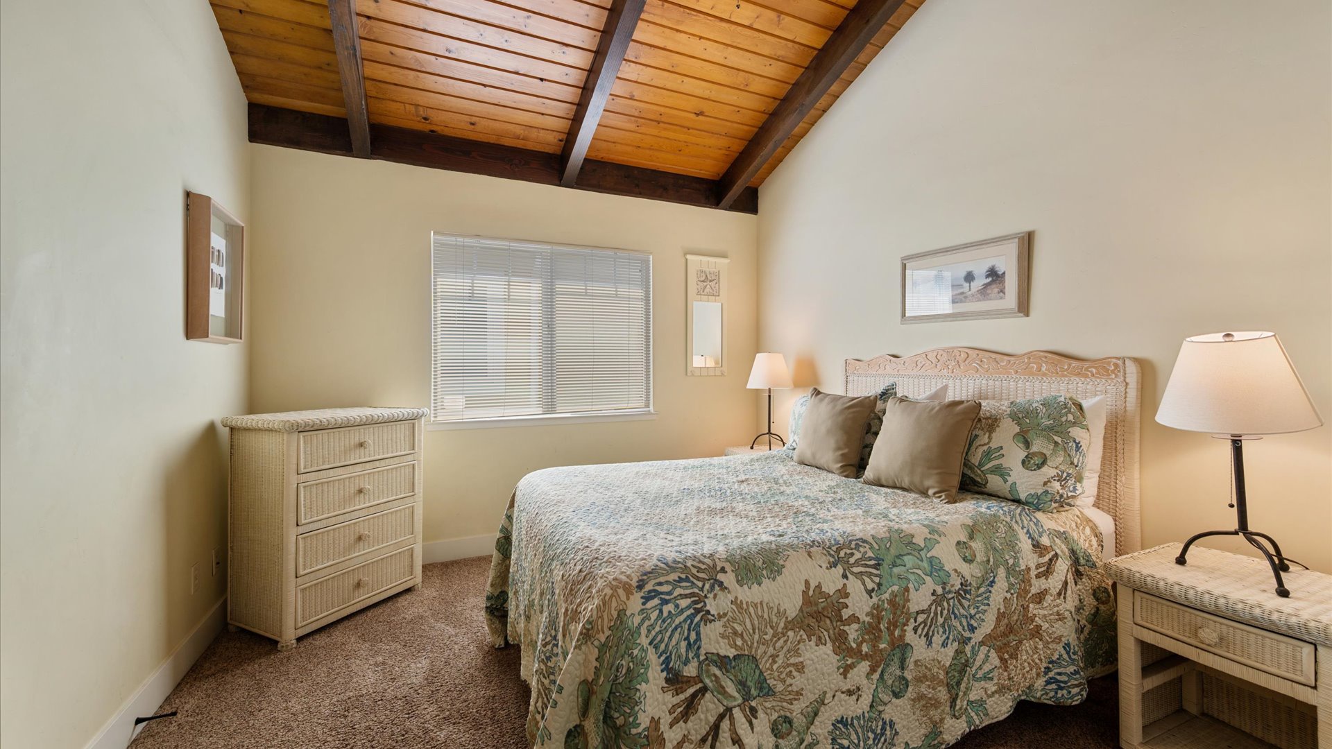 The second bedroom has a queen bed and shares a Jack and Jill bathroom with the 3rd bedroom.