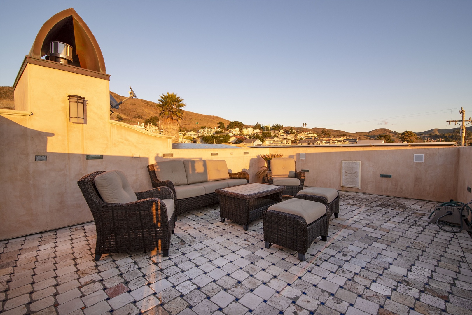 Ample lounge seating on the rooftop deck to enjoy in the golden glow