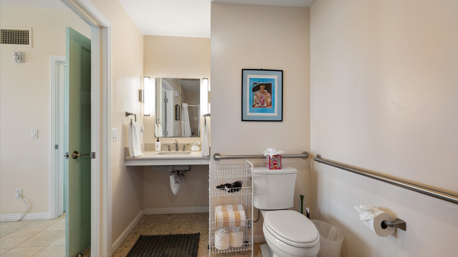 The spacious full bath is located off the bedroom.