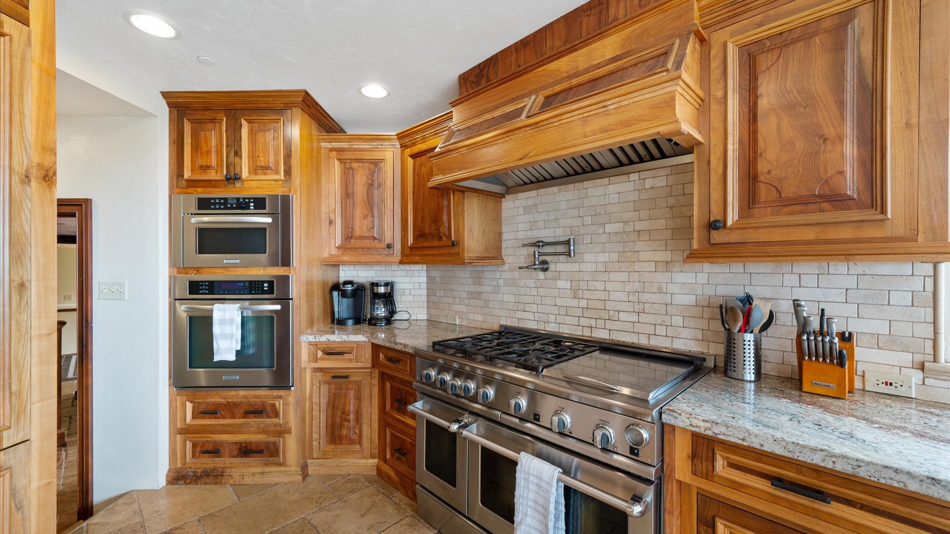 Ample counter space, high end appliances, and beautiful finishes in the Kitchen