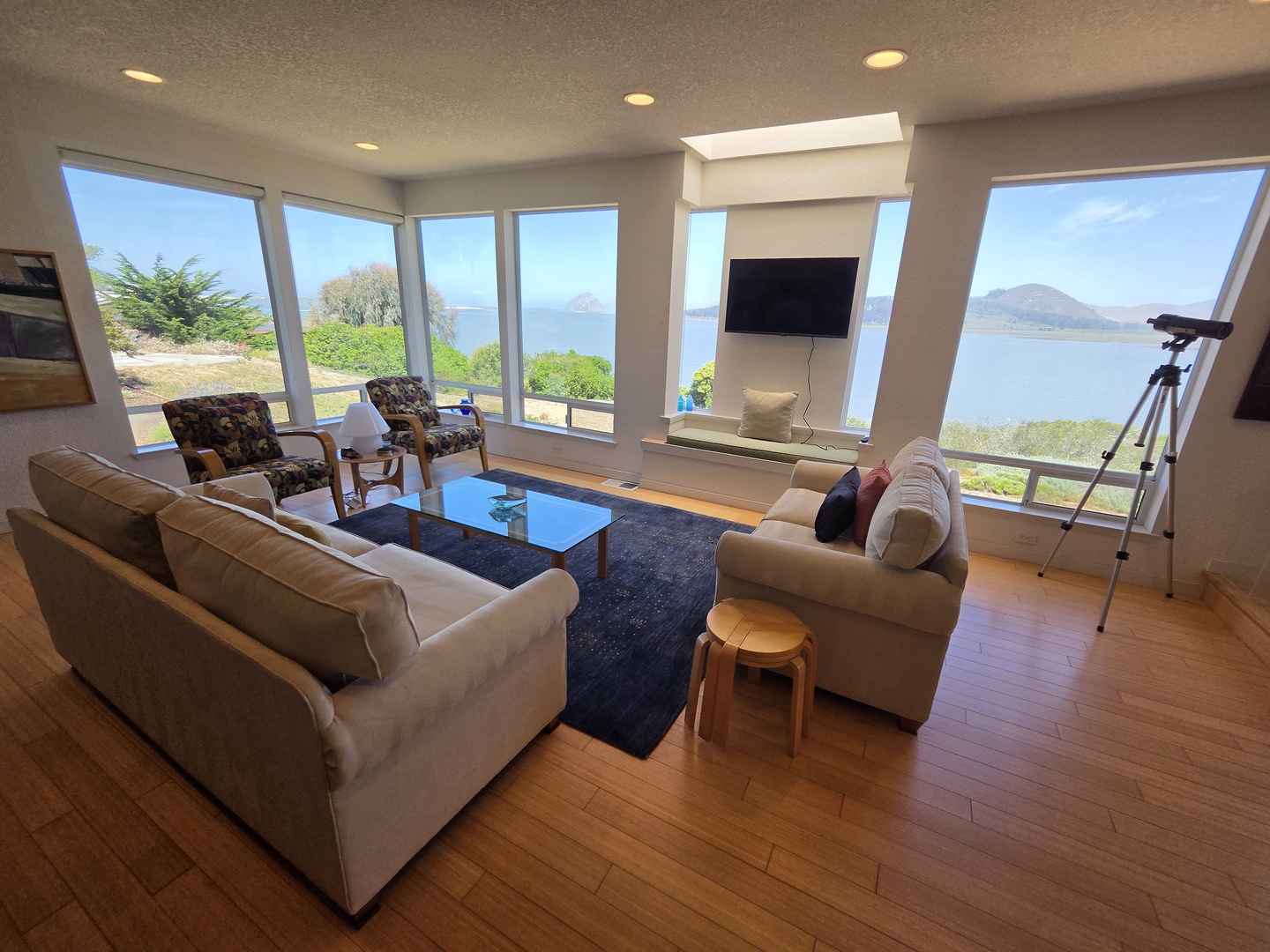 Sink into the plush sofas and enjoy your favorite shows or movies on the flat screen tv with a view