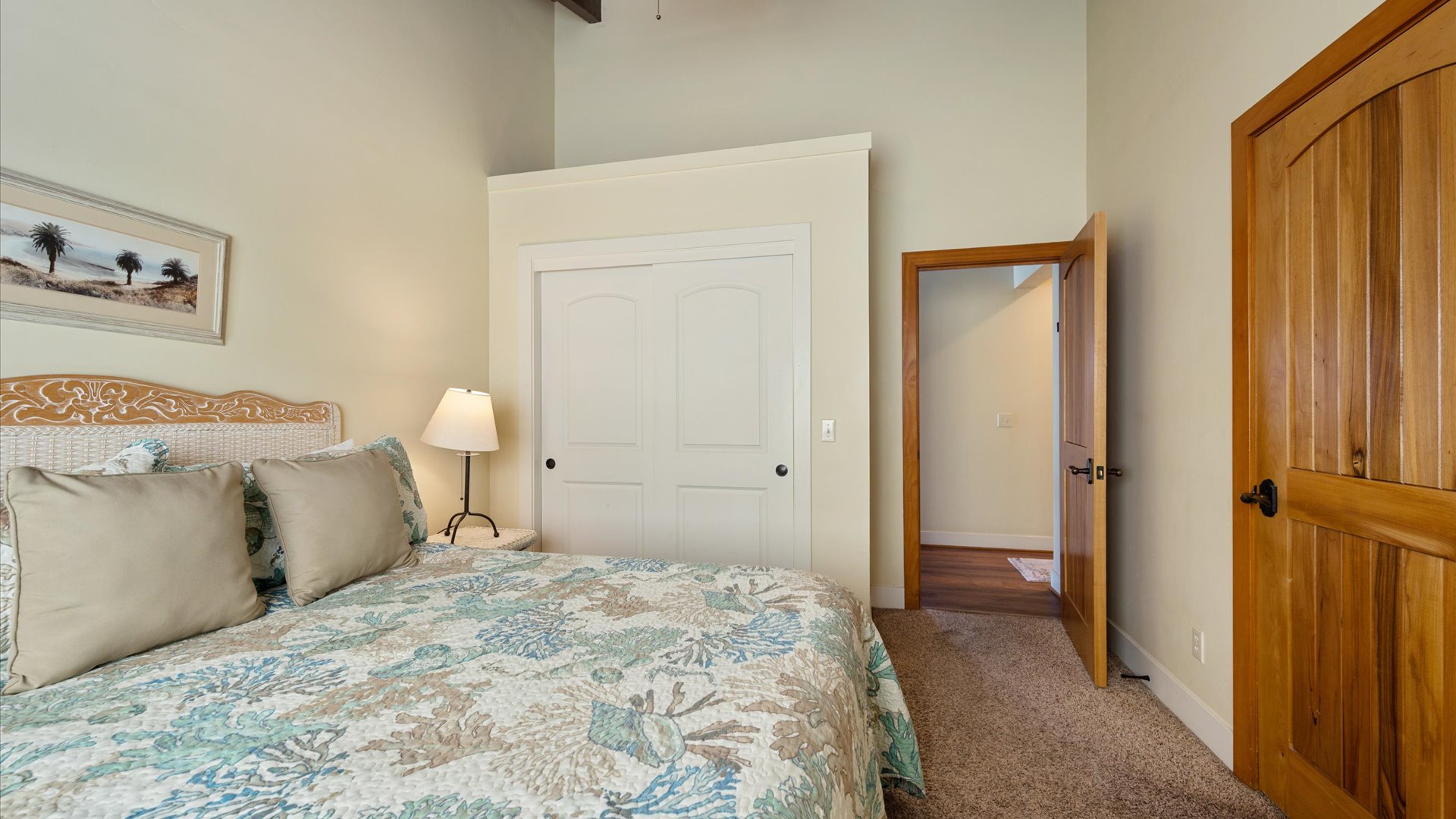 The peaceful second bedroom with coastal touches