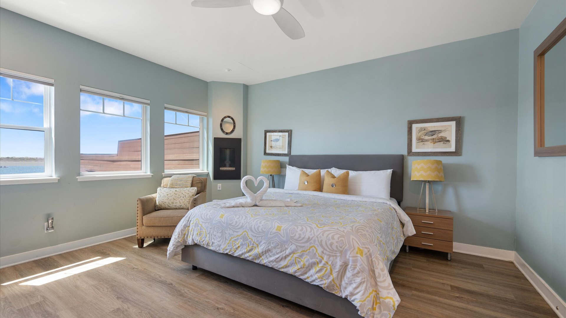 The private bedroom is a spacious retreat complete with king-size bed, flat screen tv, and fireplace