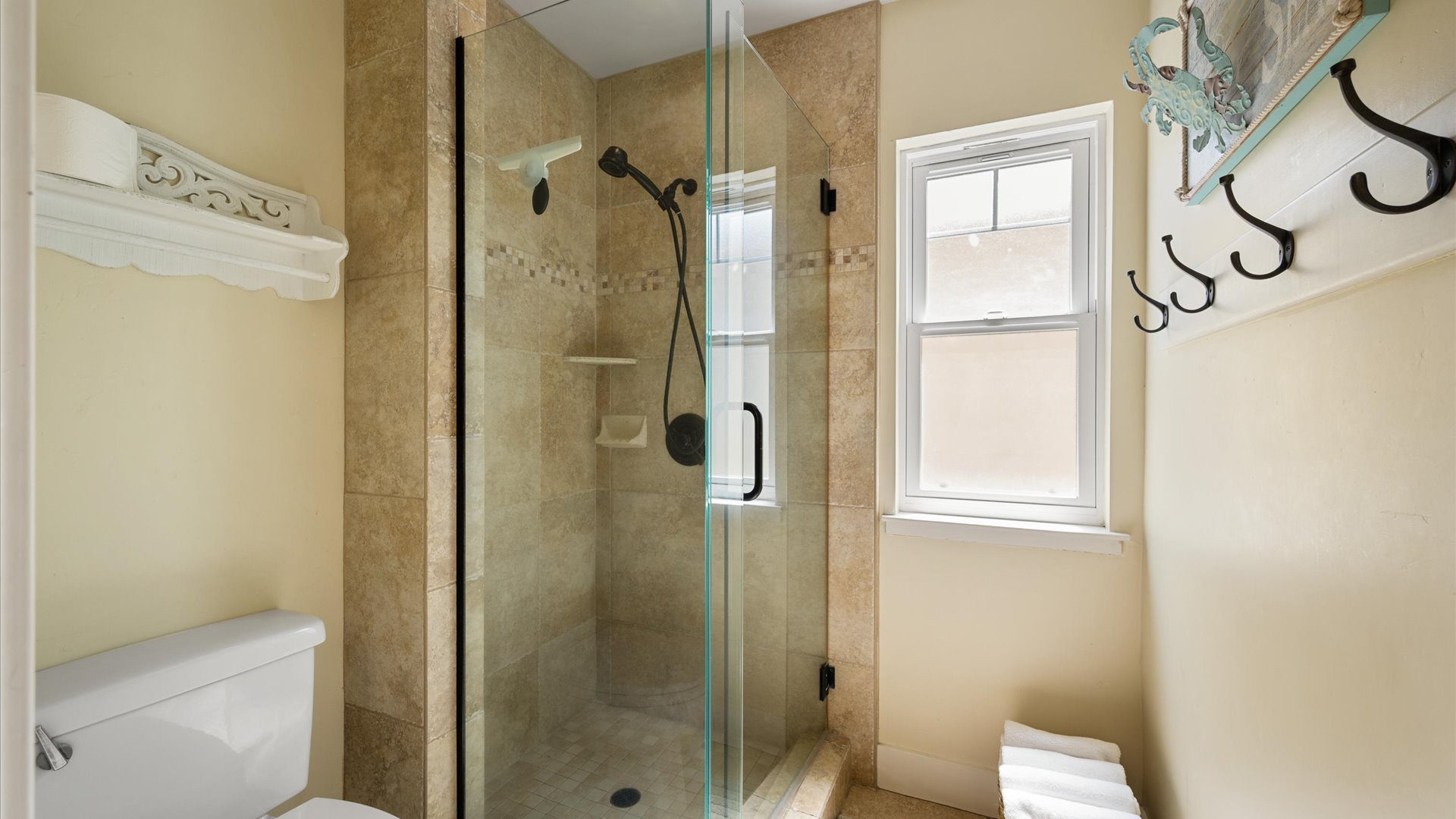 Large step in shower in the Jack and Jill bath