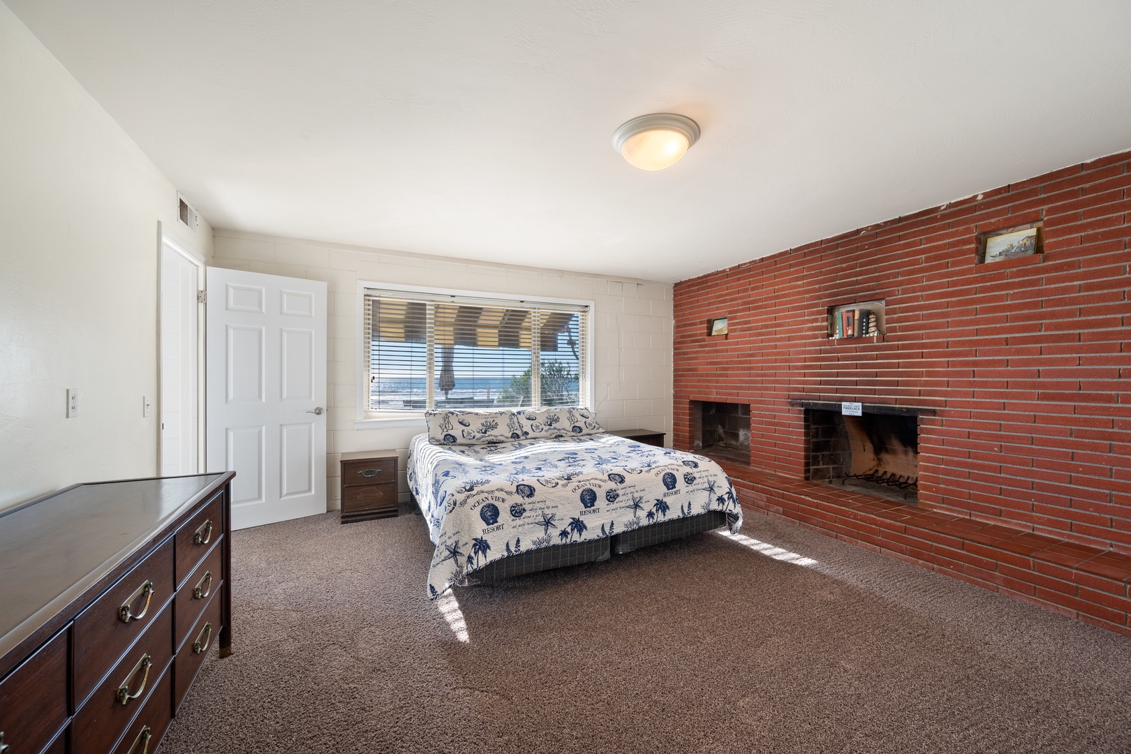 Downstairs bedroom with king sized bed, you must walk through this room to access second bedroom
