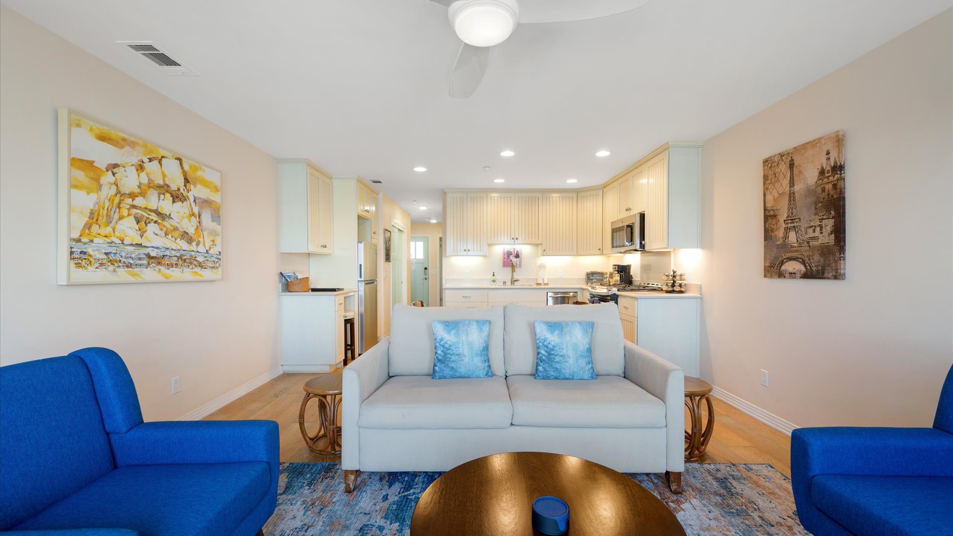 Open concept kitchen, dining, and living spaces