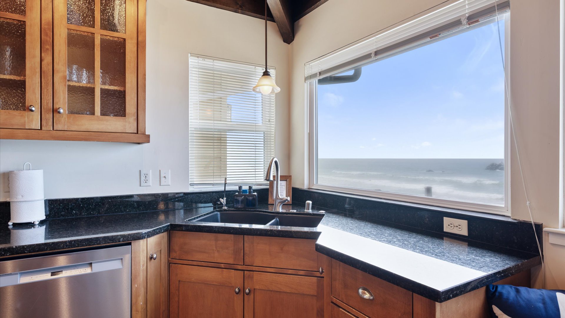 Prepare meals with this beautiful coastal view