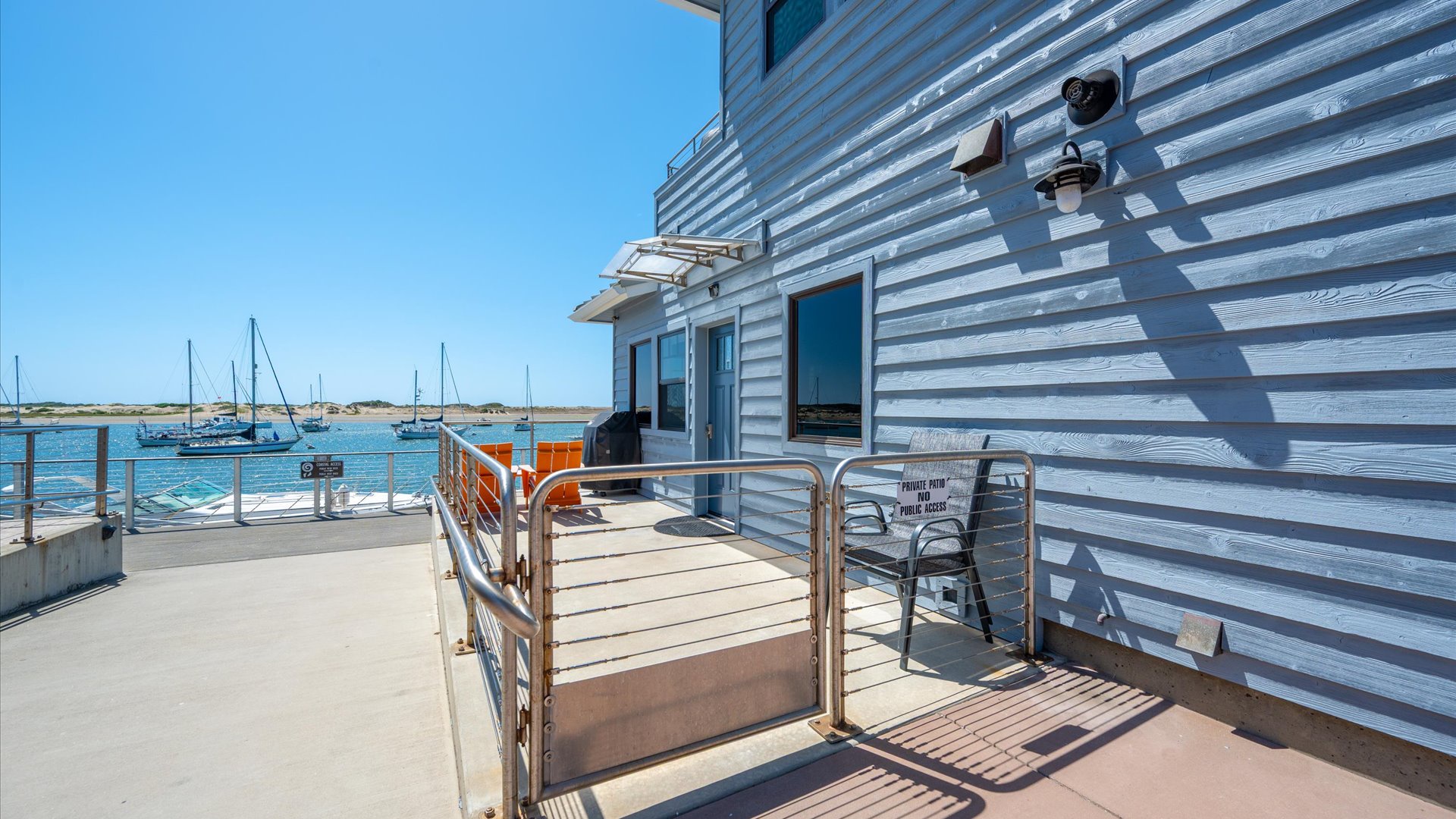 Your bayfront patio is located next to the public access walkway with privacy gate, fully enclosed