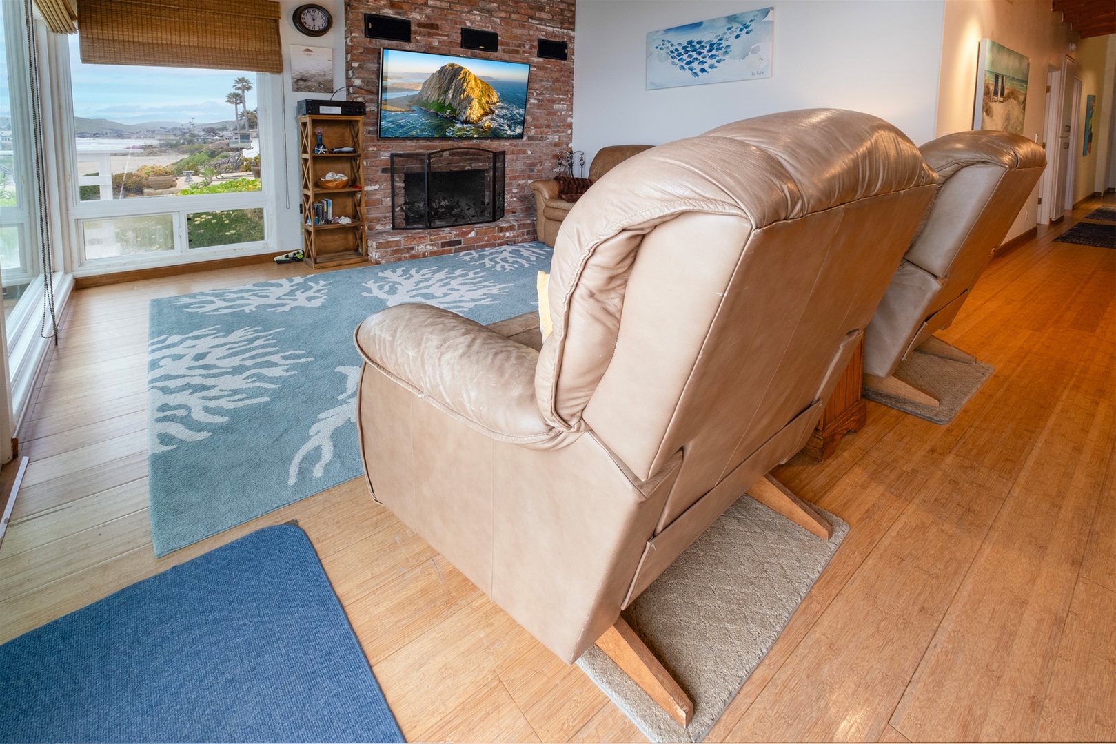 Living room complete with comfortable seating and flat screen tv