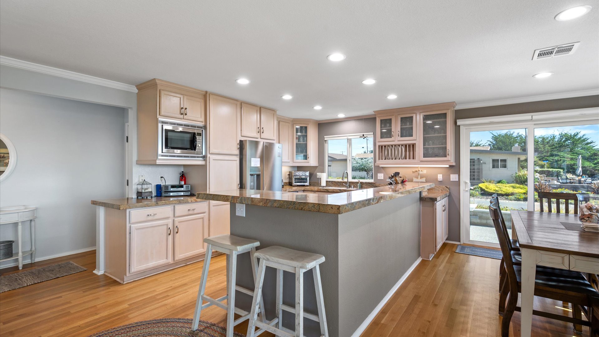 The kitchen with counter seating and well equipped for your cooking needs