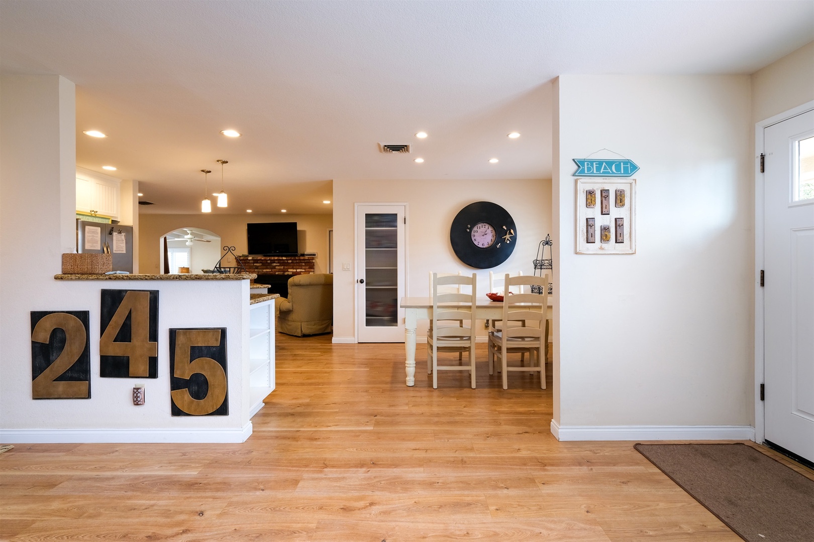 Dining and kitchen area are adjacent to the living room.