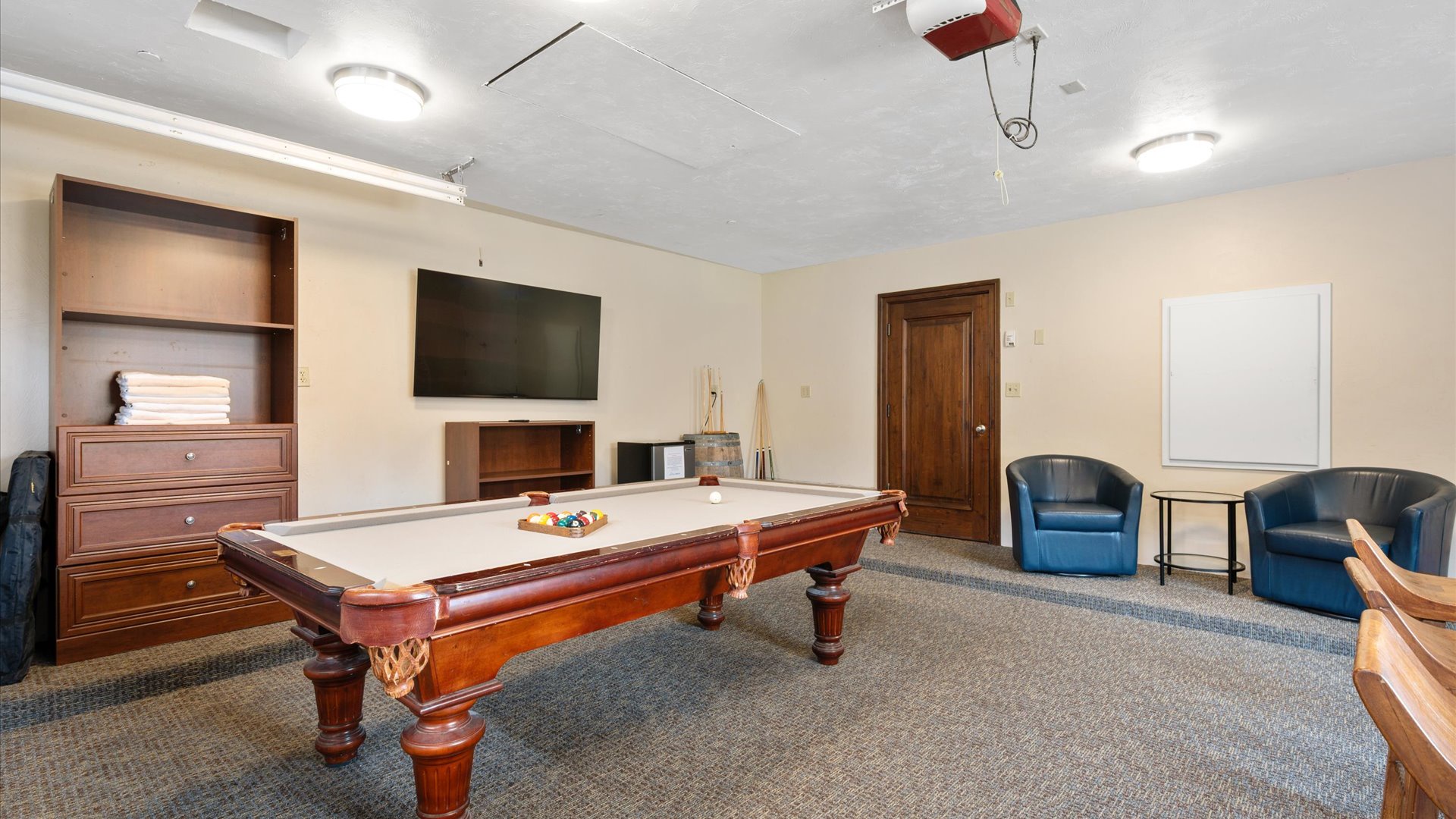 Challenge your friends to a friendly game on the full-size pool table
