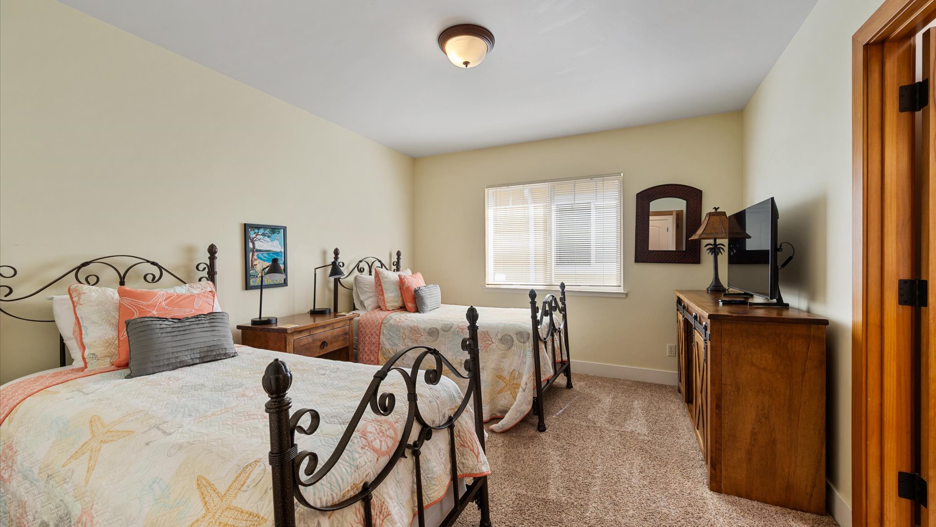 The 3rd bedroom has 2 twin beds and shares a bathroom with the queen bedroom.
