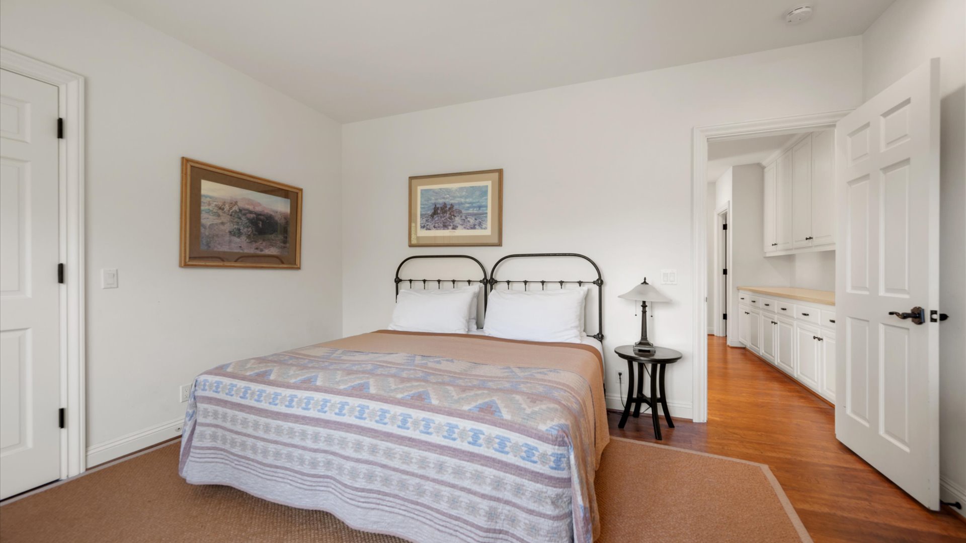 The third bedroom features a king size bed