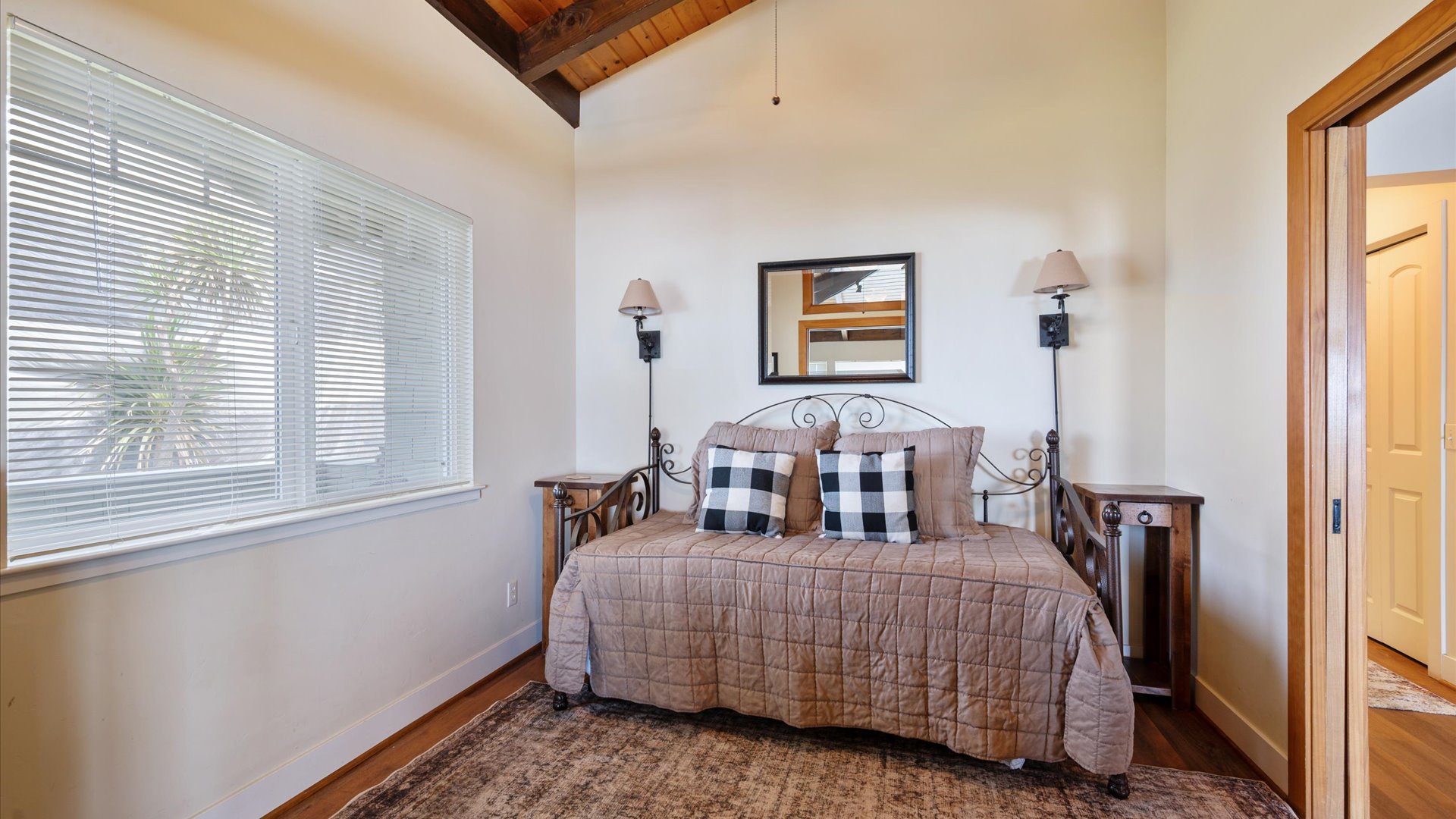 This den/4th bedroom off the living room has a trundle bed that makes into 2 single beds.  It has pocket doors so it can be closed off for privacy.