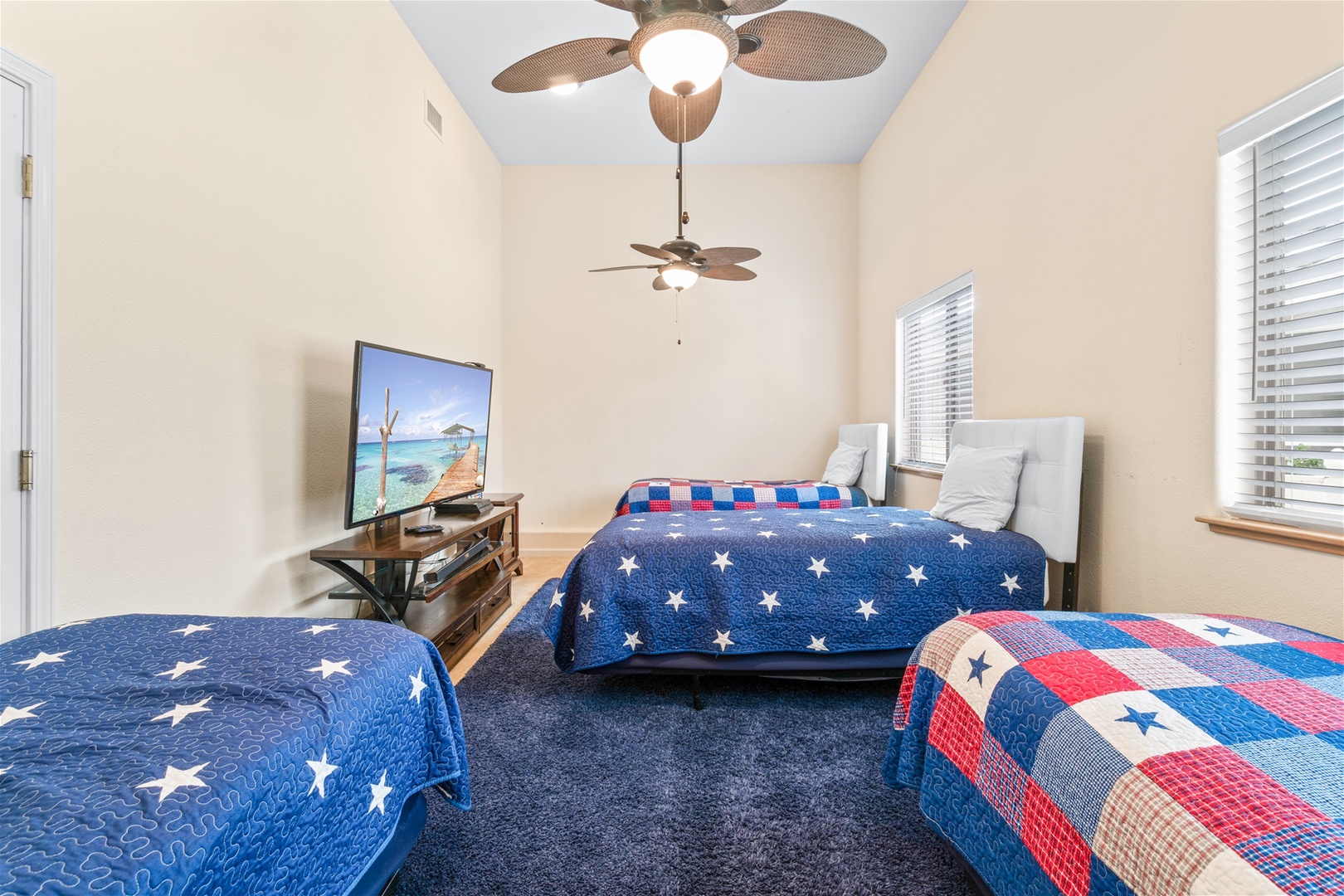 Twin bedroom is equipped with a very large Smart TV and Playstation 4.  Games not included, 1 remote provided.