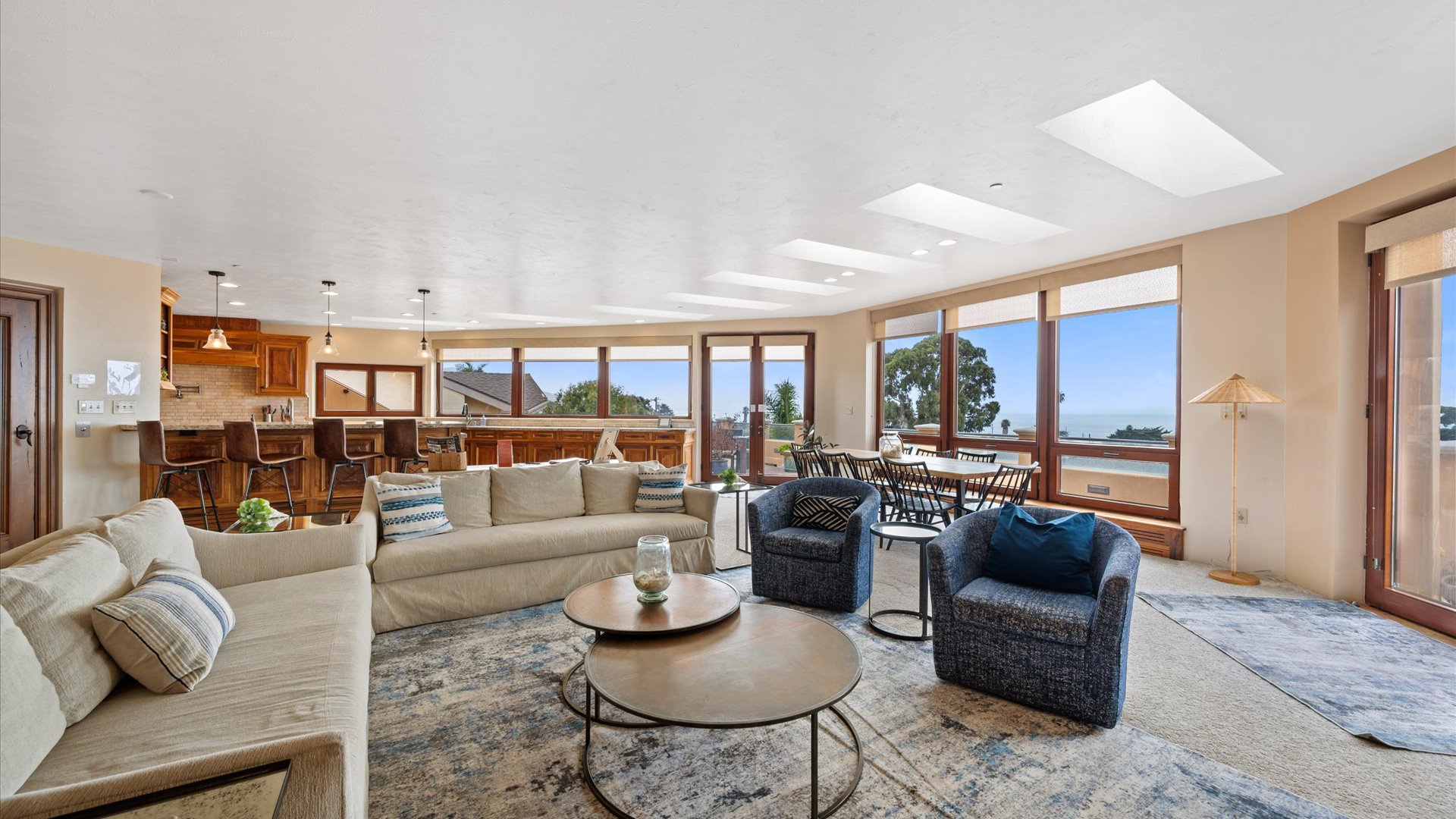 The dining area opens to living room and kitchen, perfect for entertaining