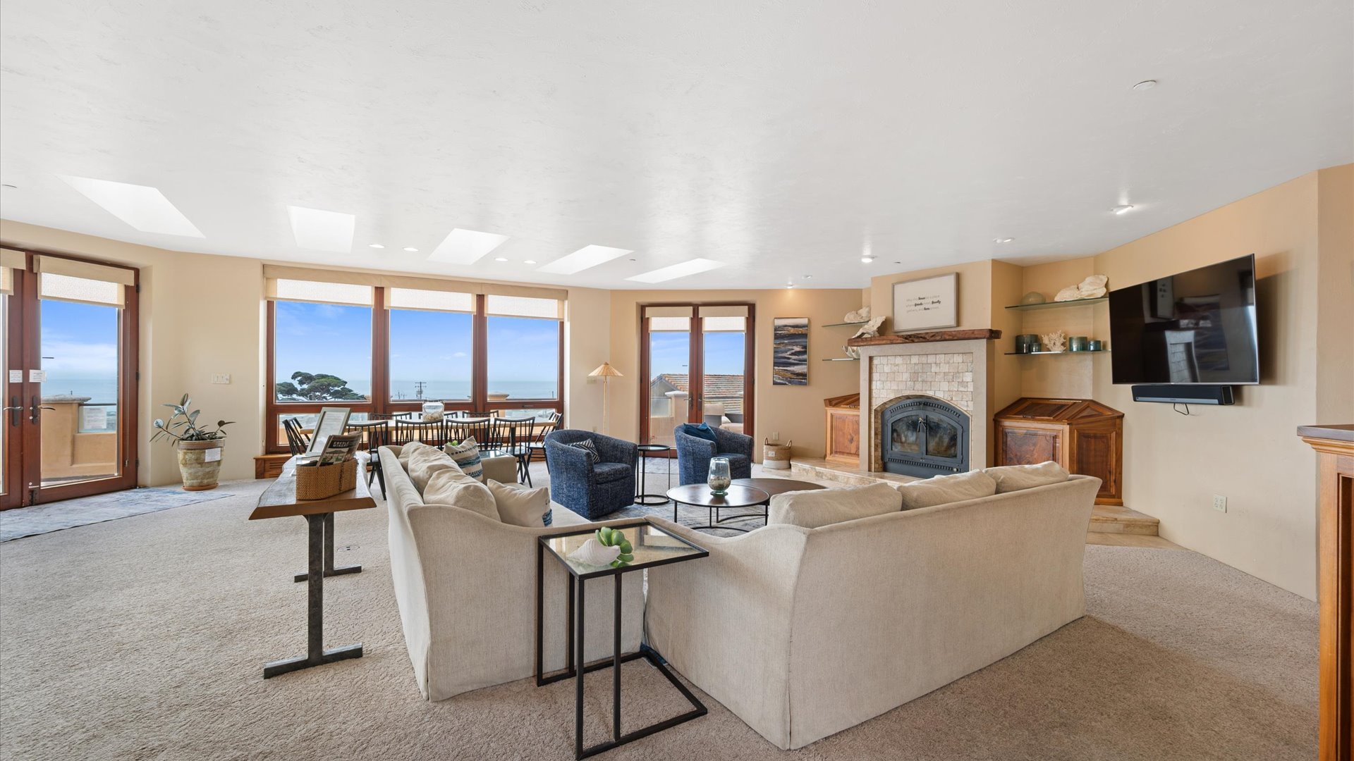 Living room features lovely seating options and a flat sceen tv