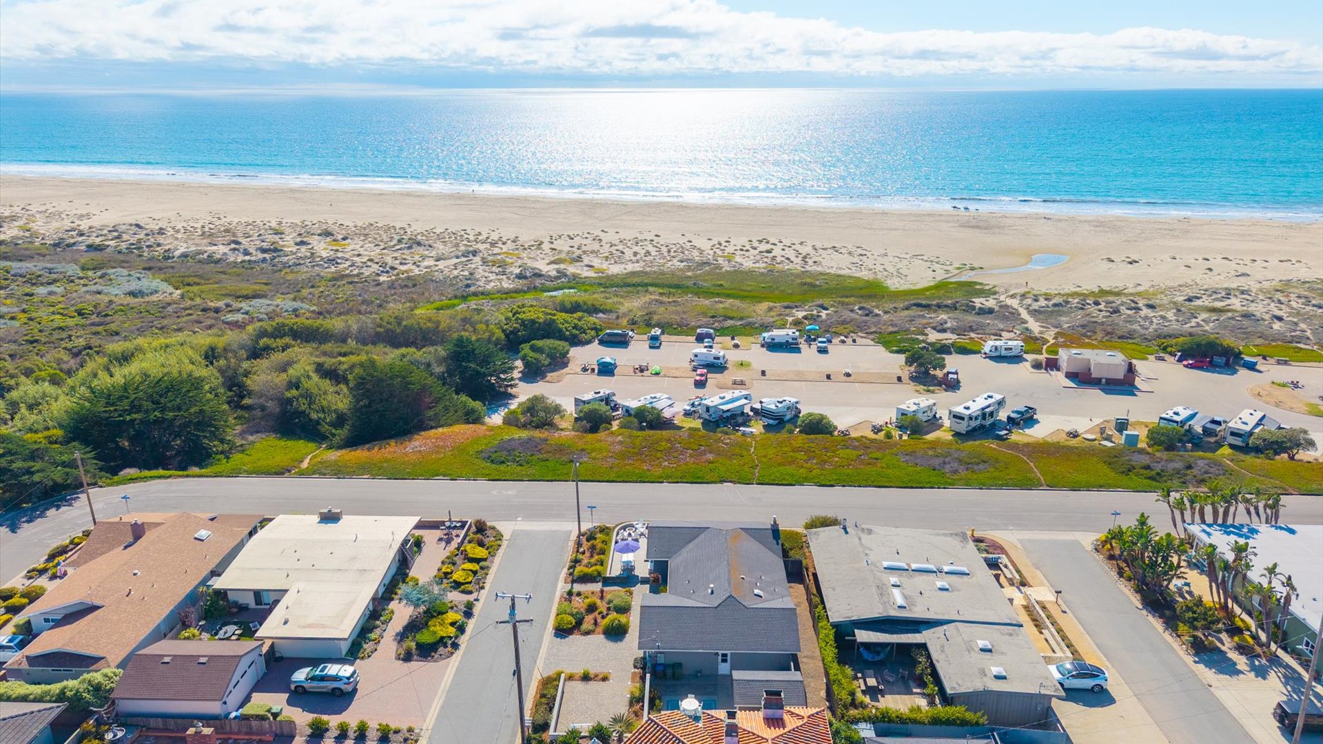 Aerial view, situated just steps from the sands and sparkling waters of the Pacific