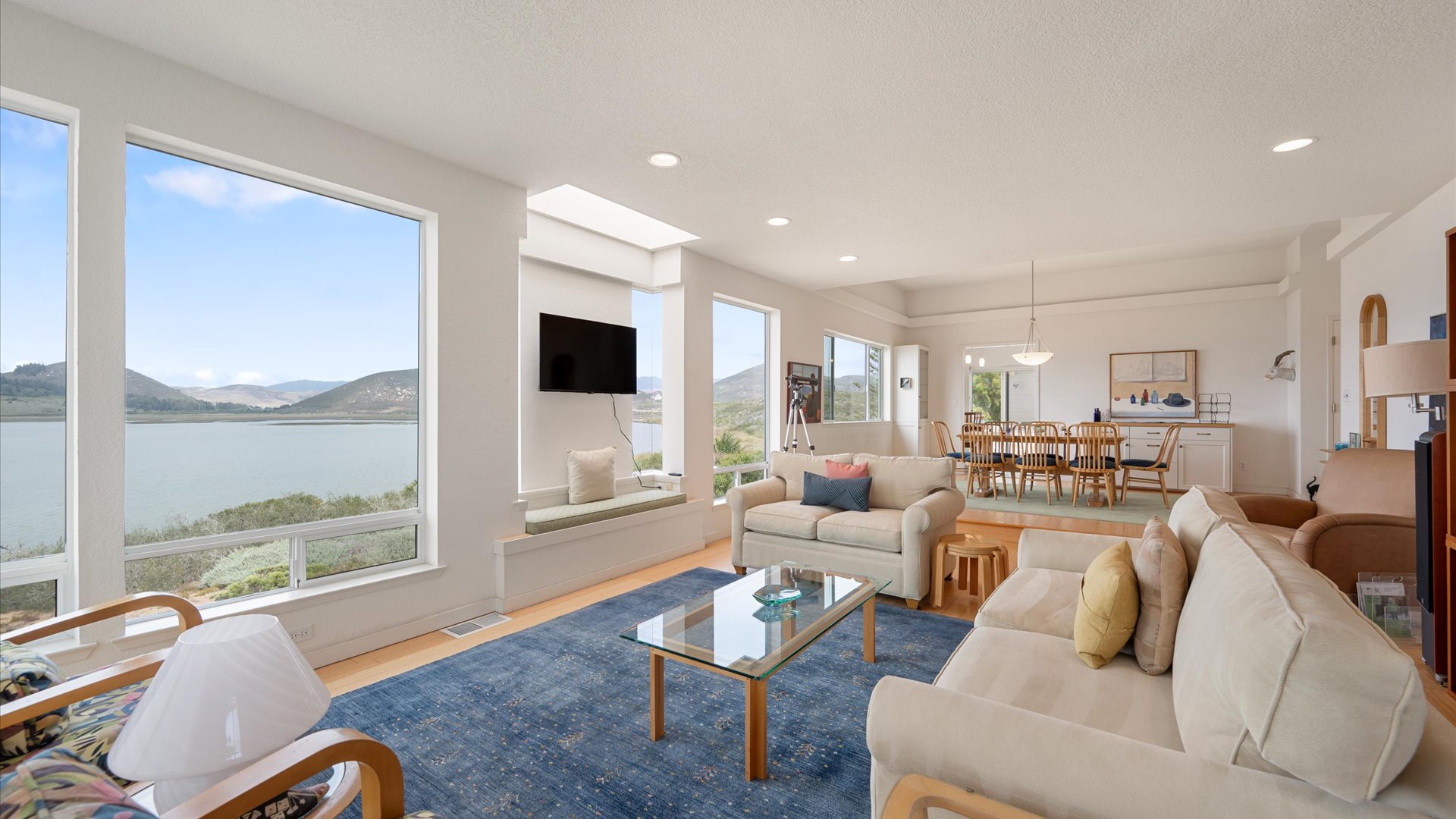 Sink into the plush sofas and enjoy your favorite shows or movies on the flat screen tv with a view