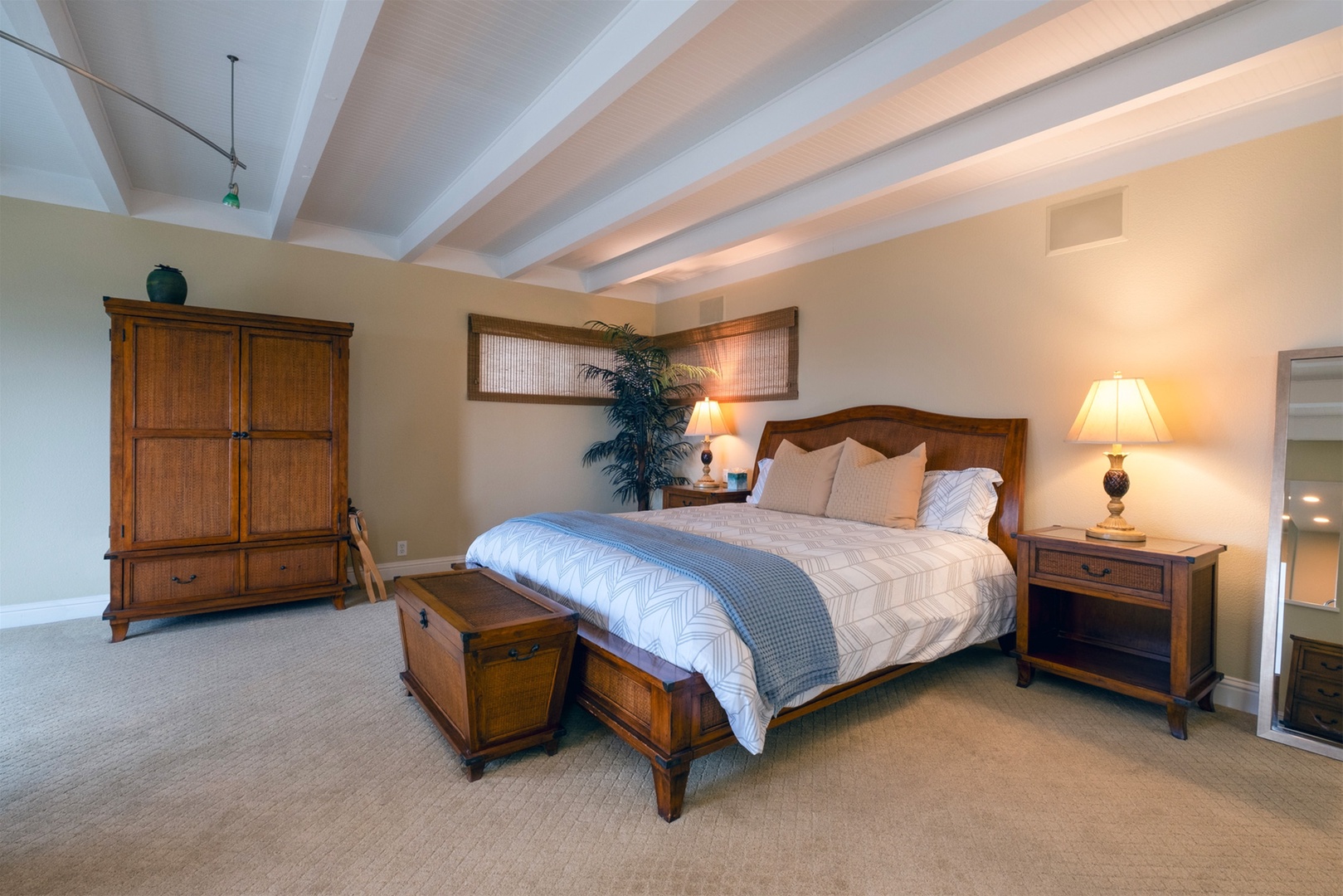 The master suite includes king sized bed, wet bar, ocean views, and ensuite bath