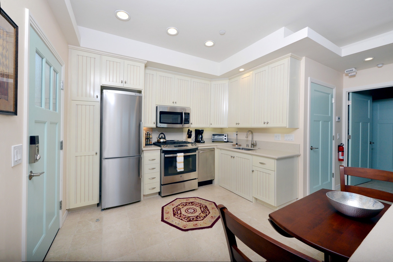 The kitchen has full size appliances and opens to living room. And you still get to enjoy the great views.